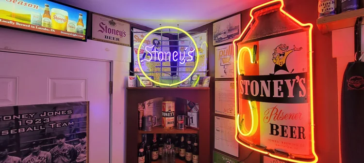 Corner display of Stoney's neon signs and lit advertising