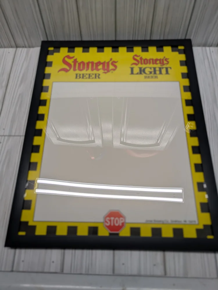 Framed Stoney's Beer and Stoney's Light checkered-border mirror sign