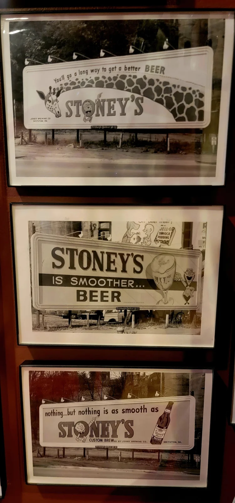 Stacked framed black-and-white Stoney's signs