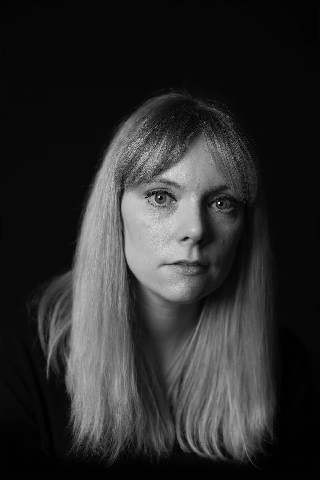 Monochrome photograph portrait of a woman sufferer of Hyperemesis Gravidarum produced by photographer Clare Hughes.