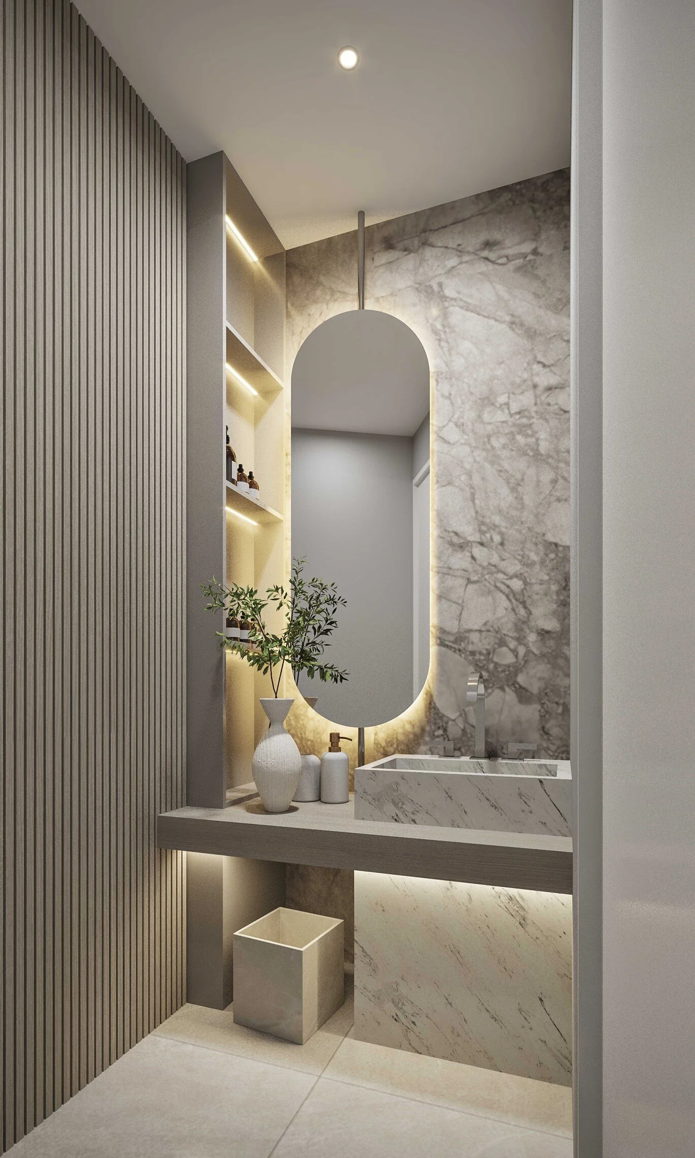 Elegant powder bathroom featuring a custom vanity wall in natural stone, complemented by an oval-shaped mirror. The mix of textures and warm lighting adds sophistication and timeless charm