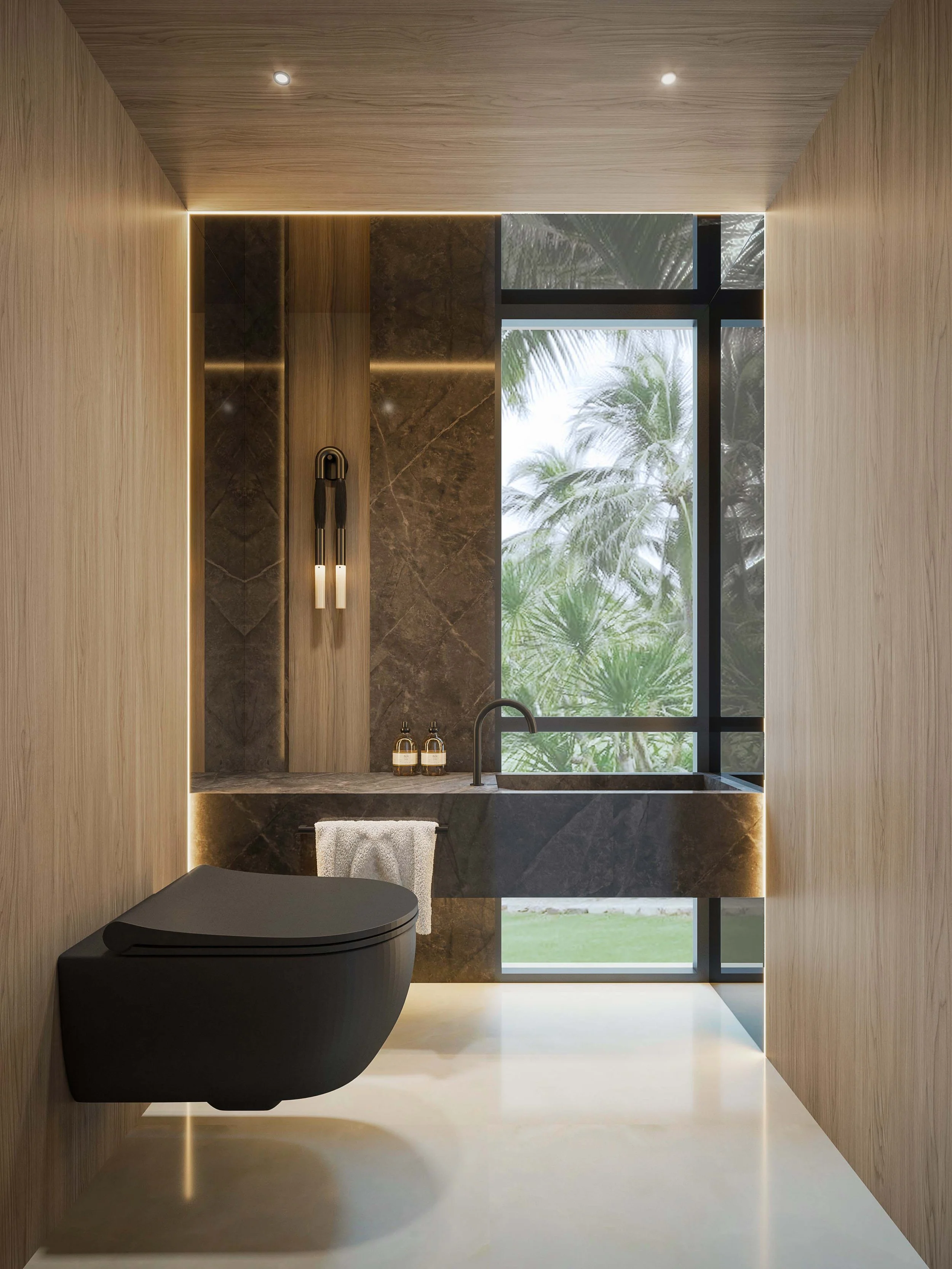 A sophisticated powder bathroom defined by rich dark stone surfaces and warm wood accents, creating a bold yet balanced atmosphere. The floating vanity enhances the sense of lightness and modernity, while clean lines and refined materials elevate the