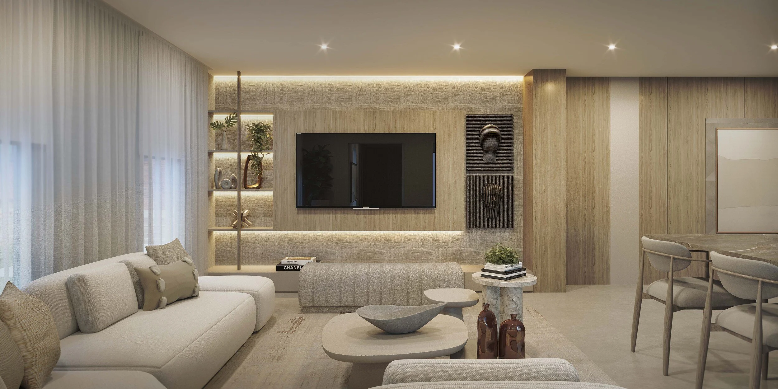 A contemporary family room designed with a softly curved sectional sofa that creates an inviting and fluid layout. A custom media wall with integrated open shelving, curated wall art, and a built-in bench adds both functionality and visual interest, 