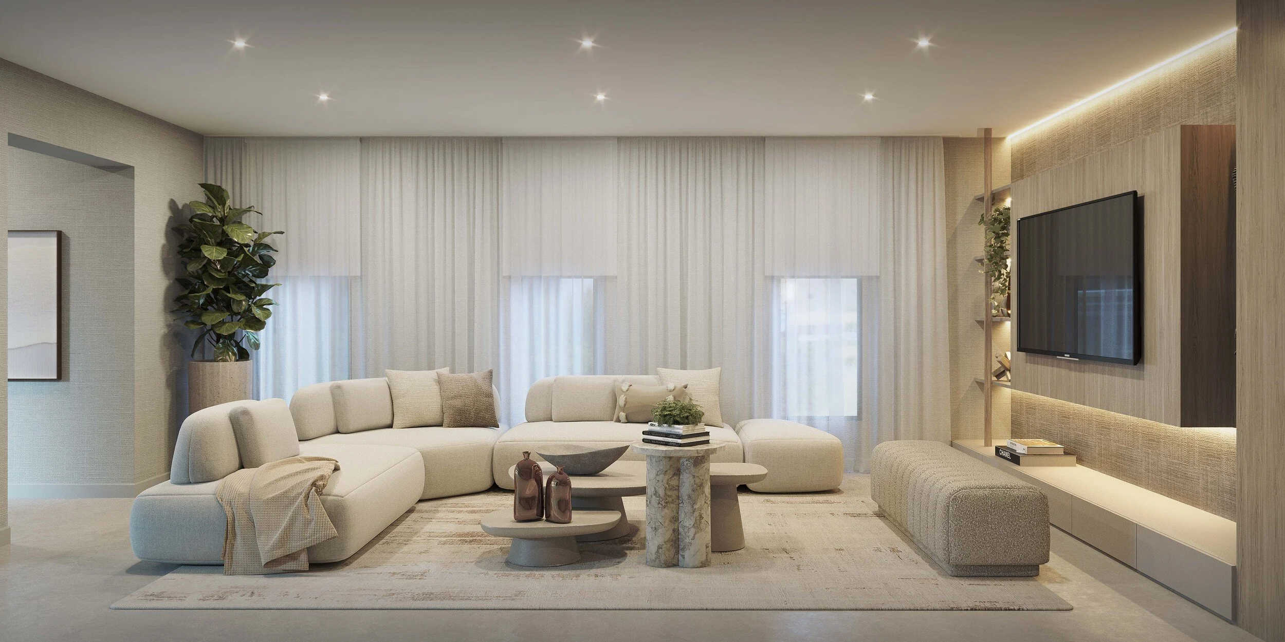 A contemporary family room designed with a softly curved sectional sofa that creates an inviting and fluid layout. A custom media wall with integrated open shelving, curated wall art, and a built-in bench adds both functionality and visual interest, 