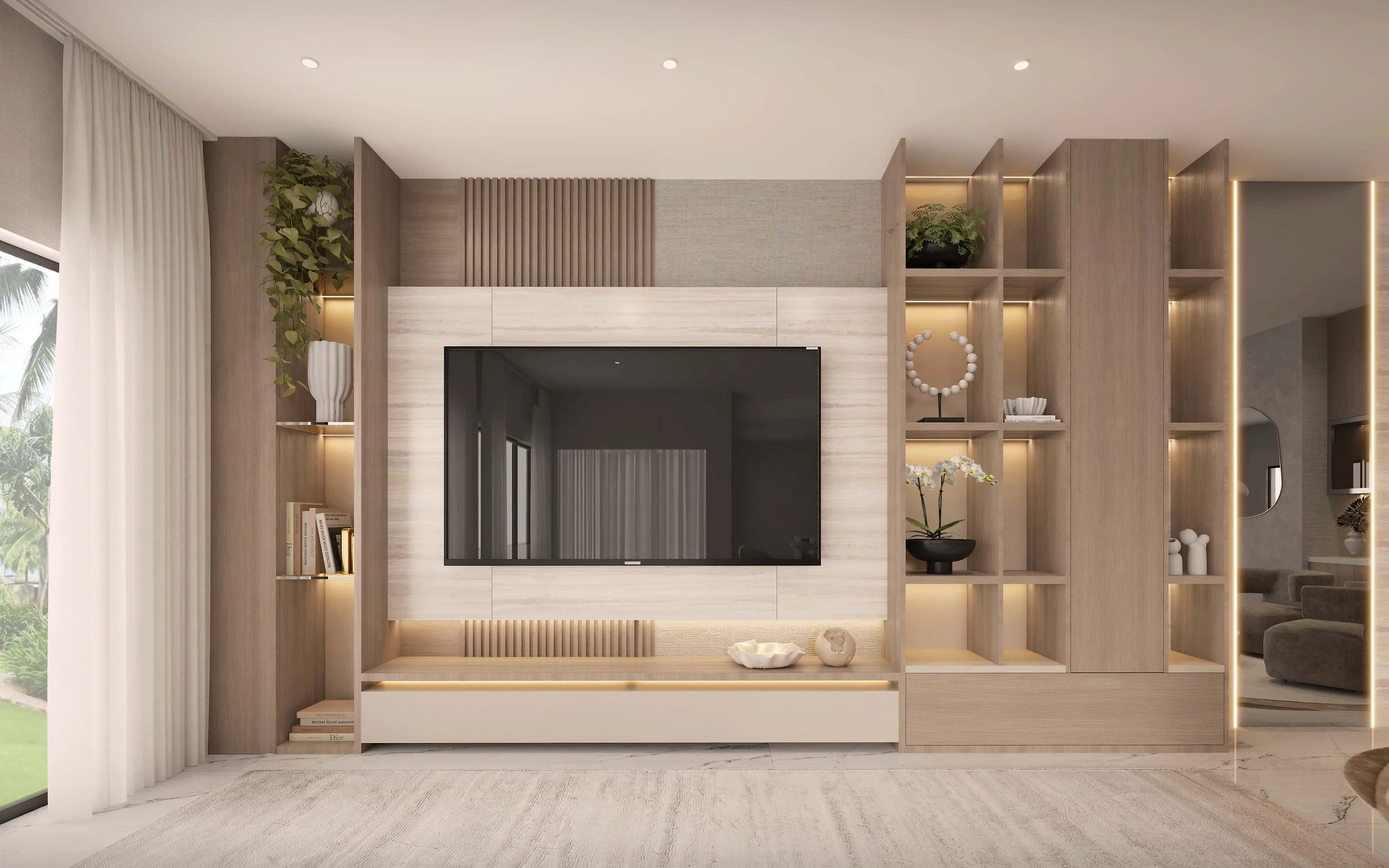 A custom media wall featuring soft open shelving that bring depth and visual interest to the design. Thoughtfully integrated storage and clean architectural lines create a balanced composition, while warm finishes enhance the refined and contemporary