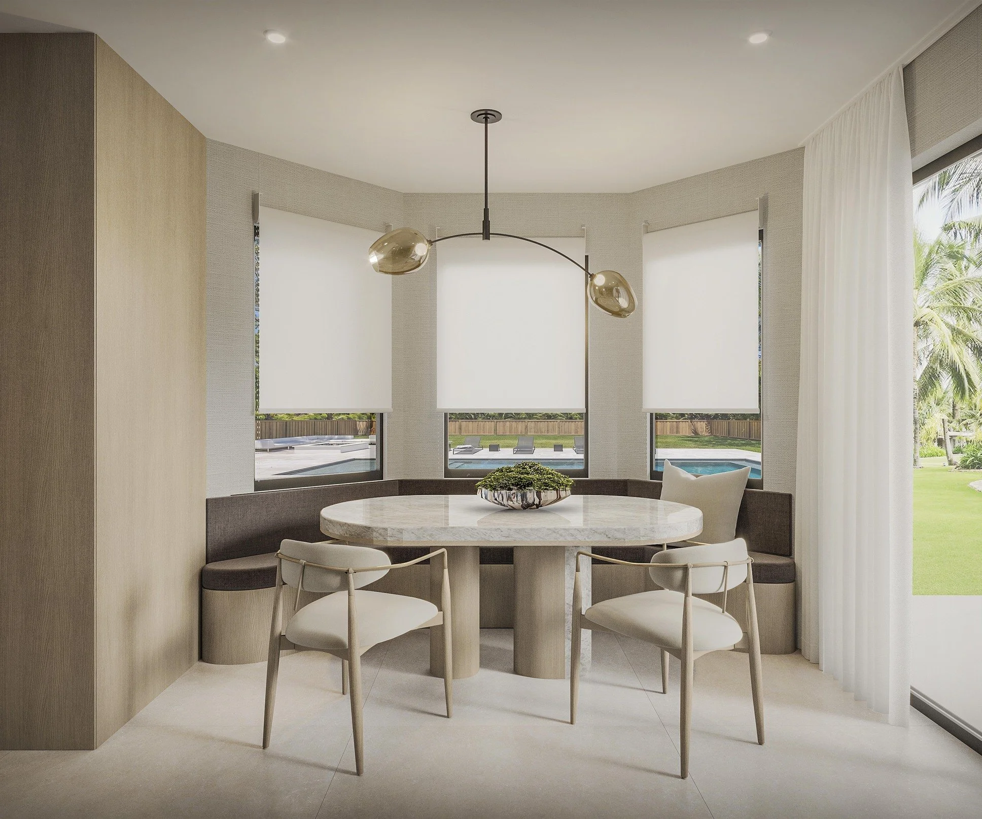 A warm and inviting breakfast nook designed to create a cozy setting for everyday meals and intimate moments. A custom built-in bench paired with a tailored dining table maximizes comfort while giving the space a refined, cohesive feel. A modern chan