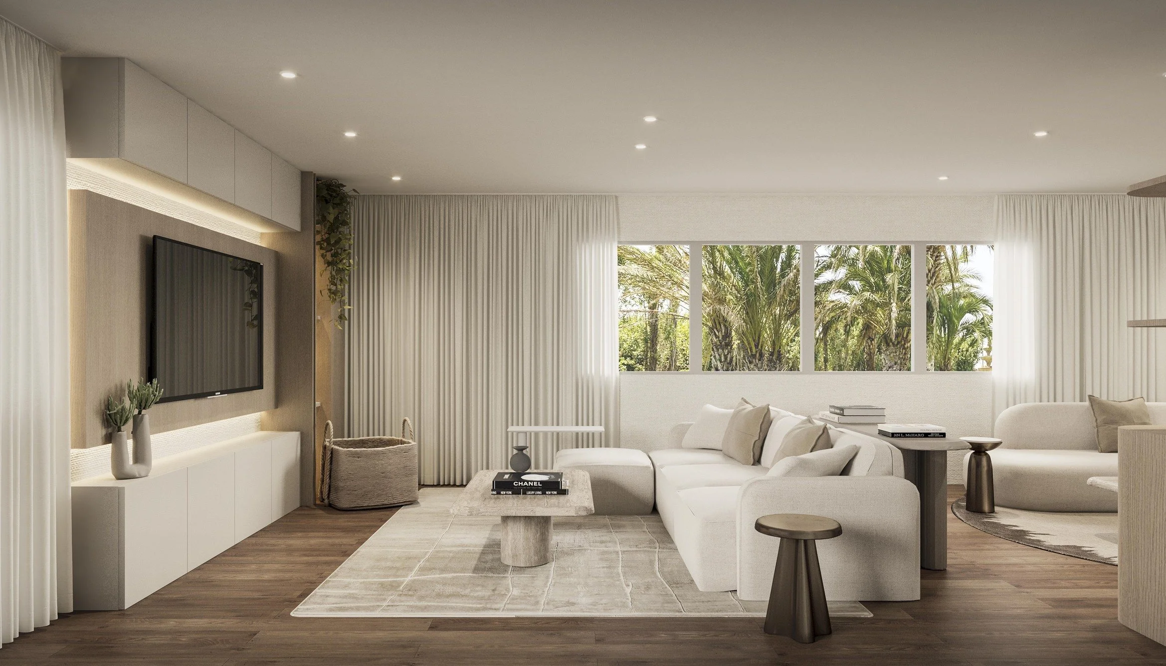 A warm and comfortable family room designed for everyday relaxation and effortless gatherings. A generously sized sectional creates a cozy foundation for the space, complemented by an elegant area rug and thoughtfully placed side tables that add text