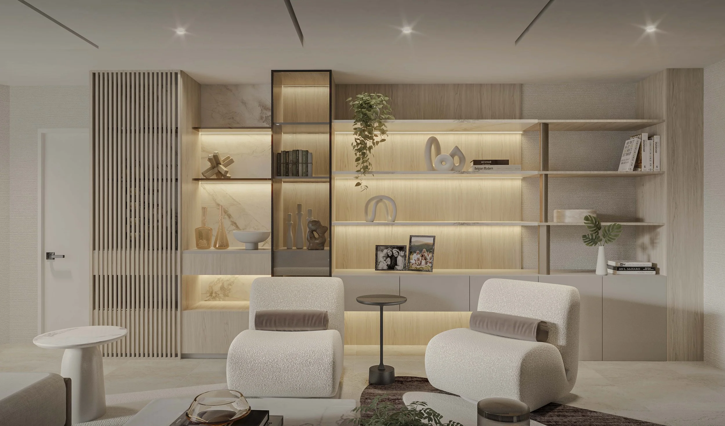 A custom living room built-in featuring open display shelving for curated accessories, adding personality and visual interest to the space. Integrated into the design, a custom bar can be discreetly hidden, combining functionality with a clean, seaml