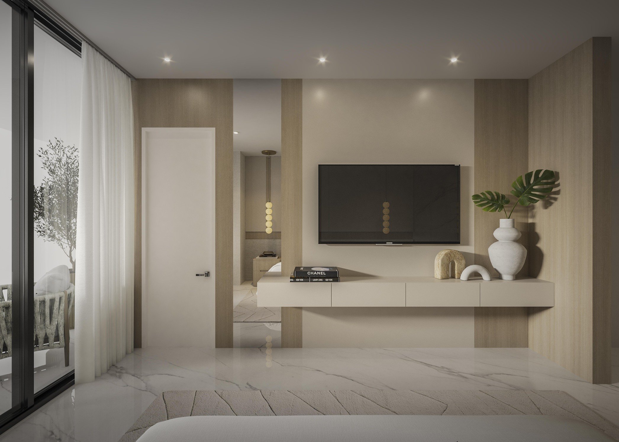 A clean and understated media wall designed with subtle paneling and a custom console that enhance the warmth and simplicity of the space. The refined composition creates a seamless focal point while maintaining a sophisticated modern aesthetic