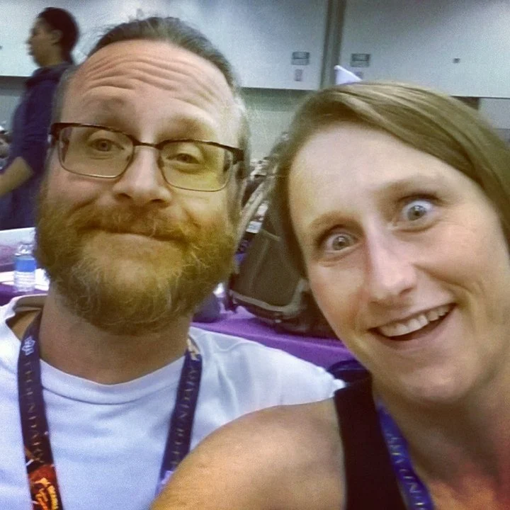 Independent authors Michael R. Swanson & Amanda K. King making funny faces at GenCon.