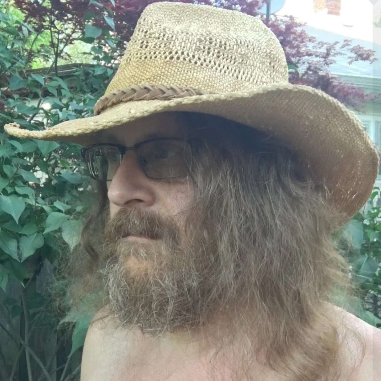 Michael R. Swanson, independent author of science fantasy novels, wearing a cowboy hat