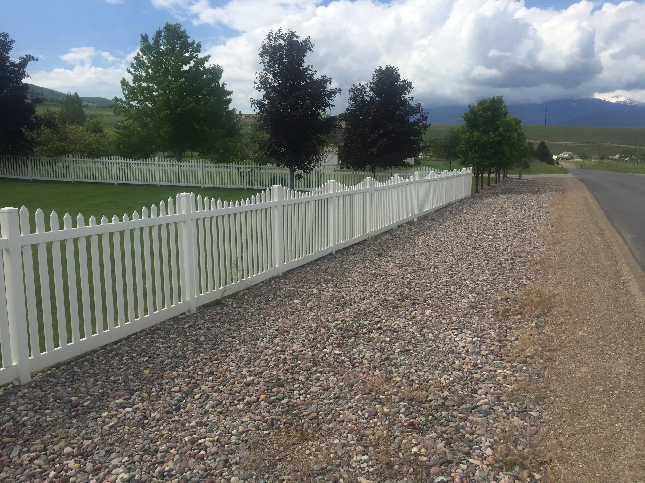A residential vinyl fence in Wes. Montana