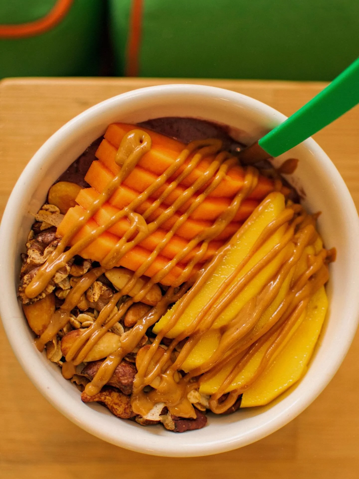 middle of the week is calling for something fresh 🥭
on the table: frozen a&ccedil;ai with mango, papaya &amp; peanut butter

could be also with different fruit and topping 🍯
you choose, we personalise!