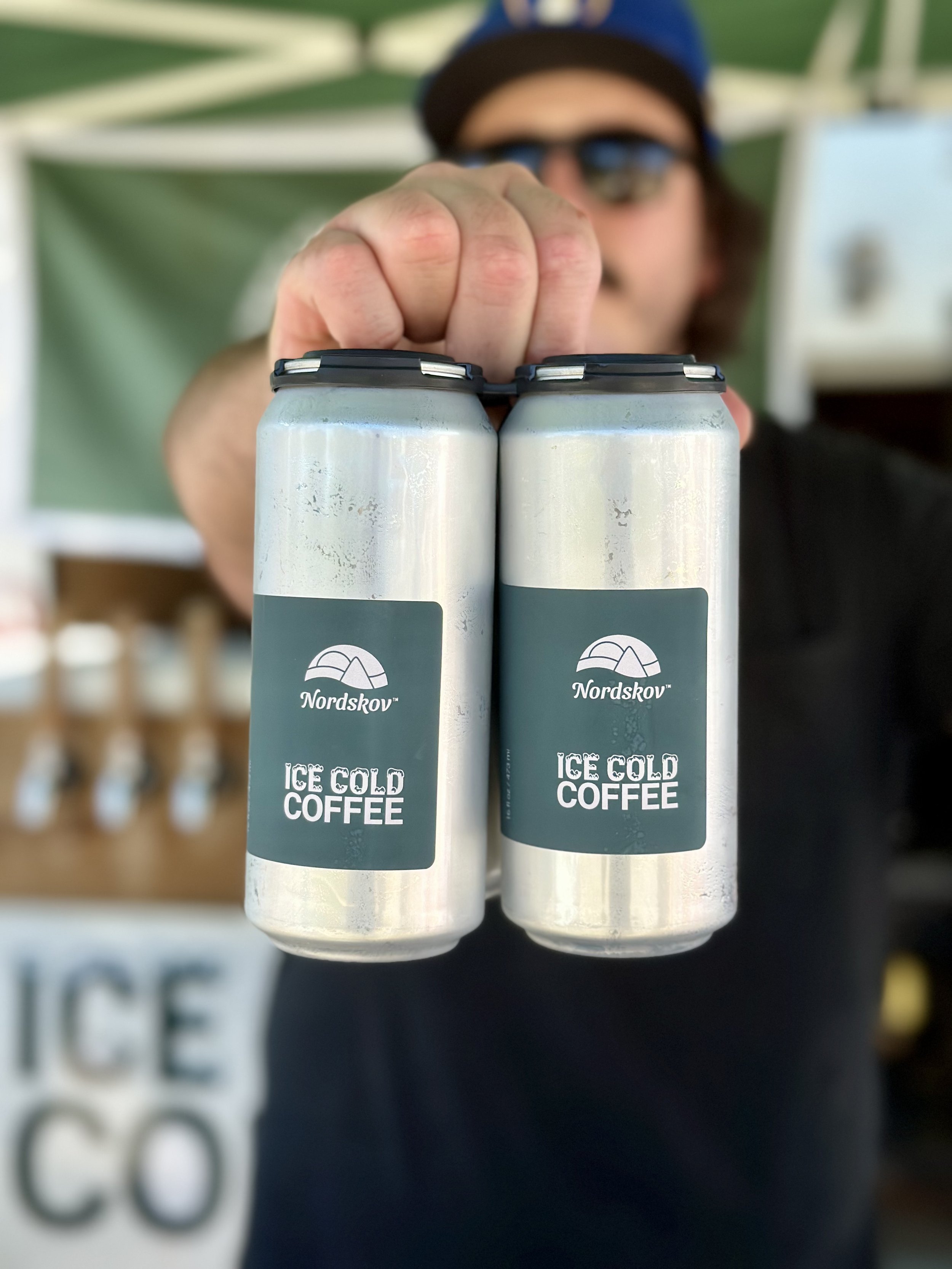 4 pack of ice cold tall boy cans of cold brew