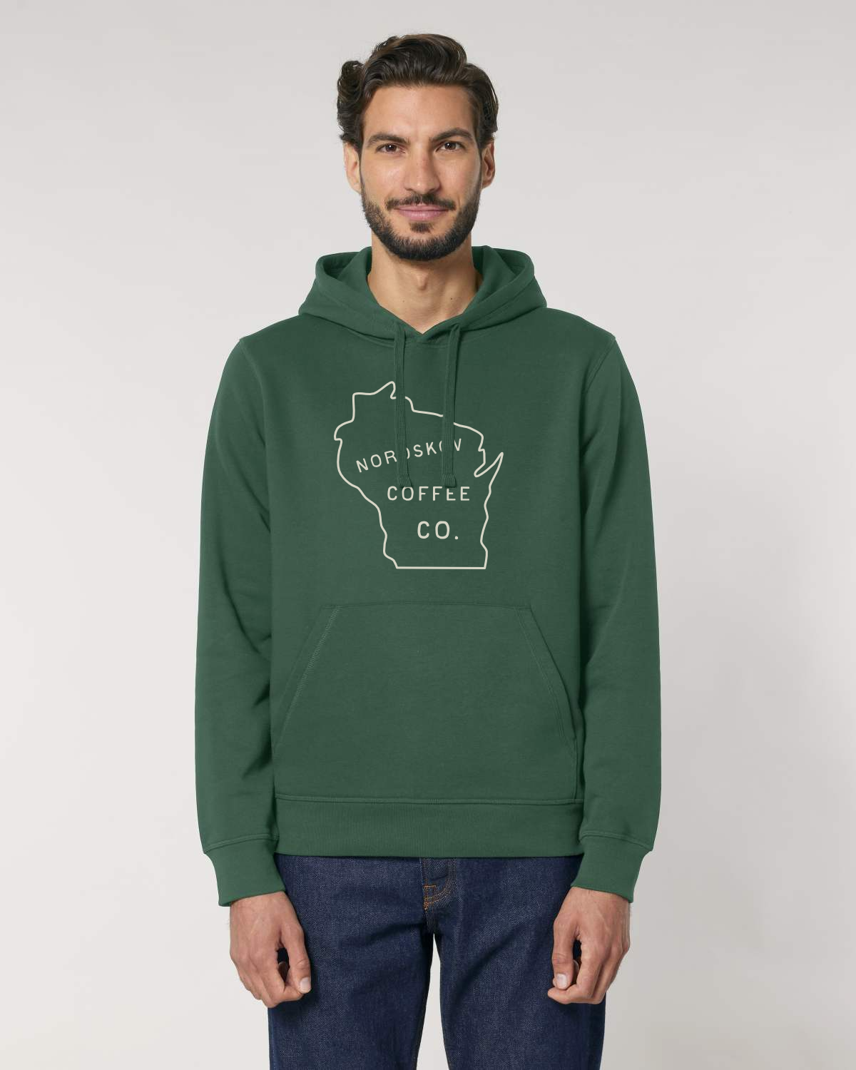 Man wearing green hooded sweatshirt with Wisconsin state outline and nordskov coffee roaster inside