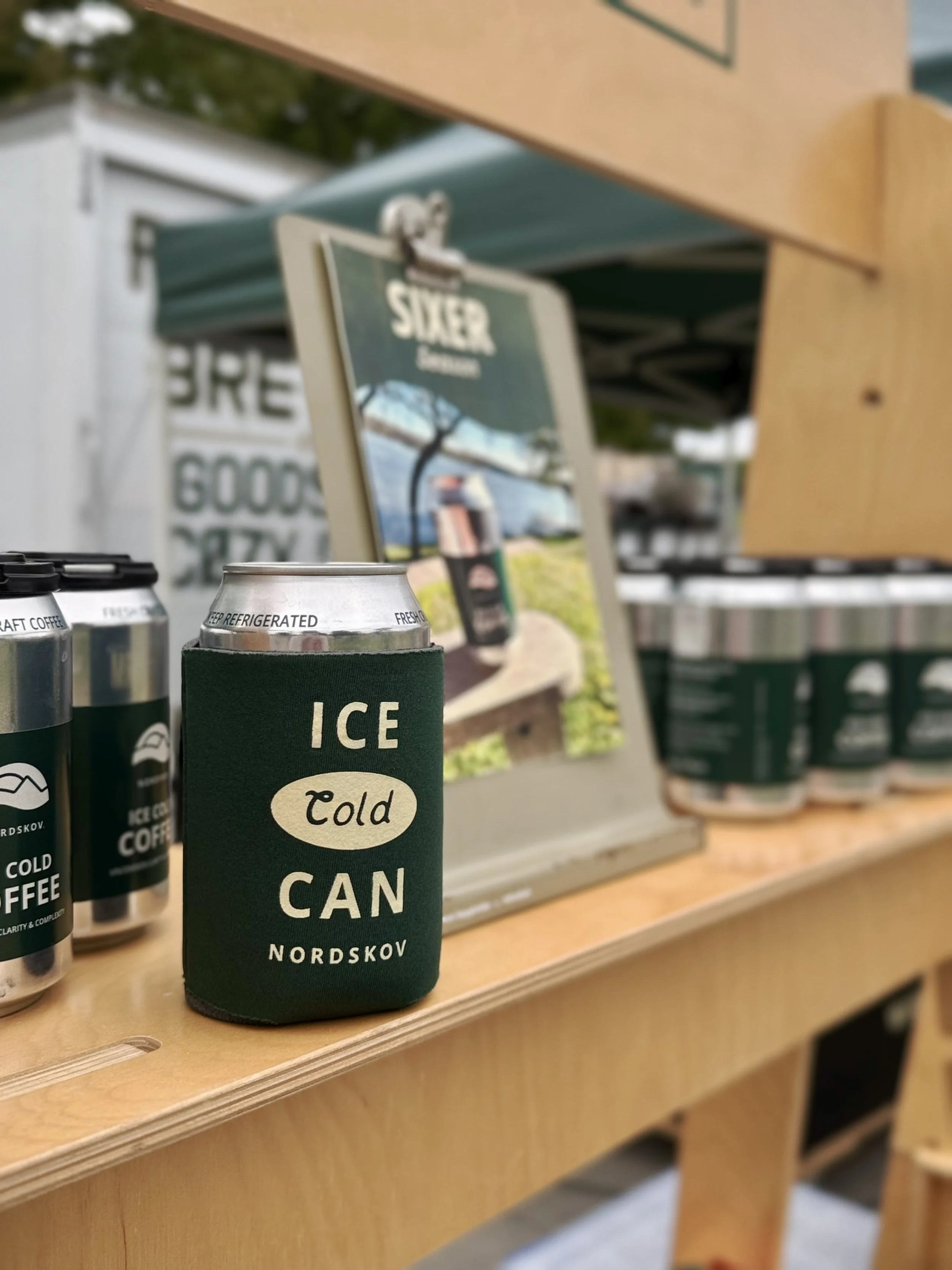 Image of Nordskov canned coffee with Nordskov koozie.jpg