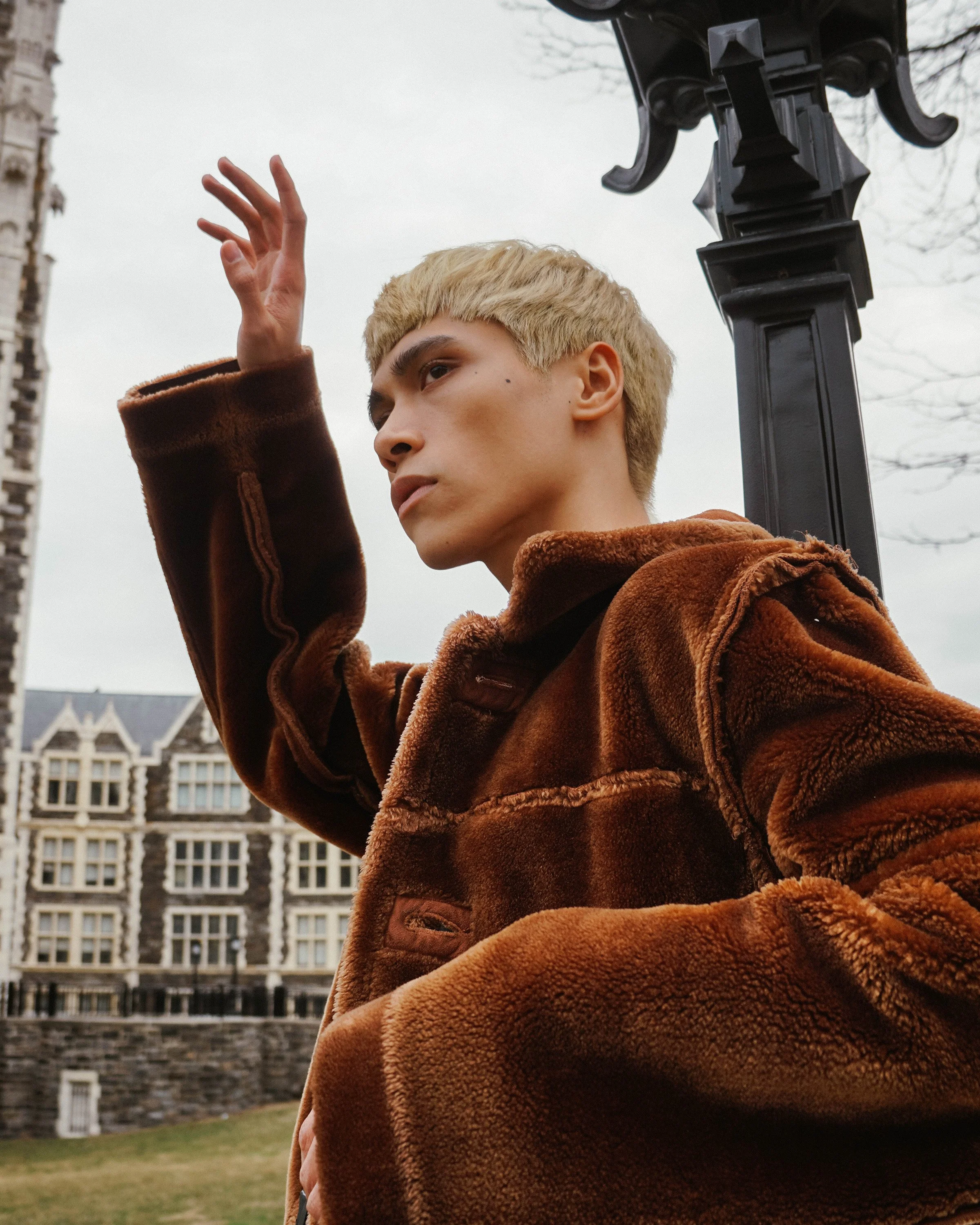 Solo model portrait captured in studio with editorial fashion lighting and contemporary styling.