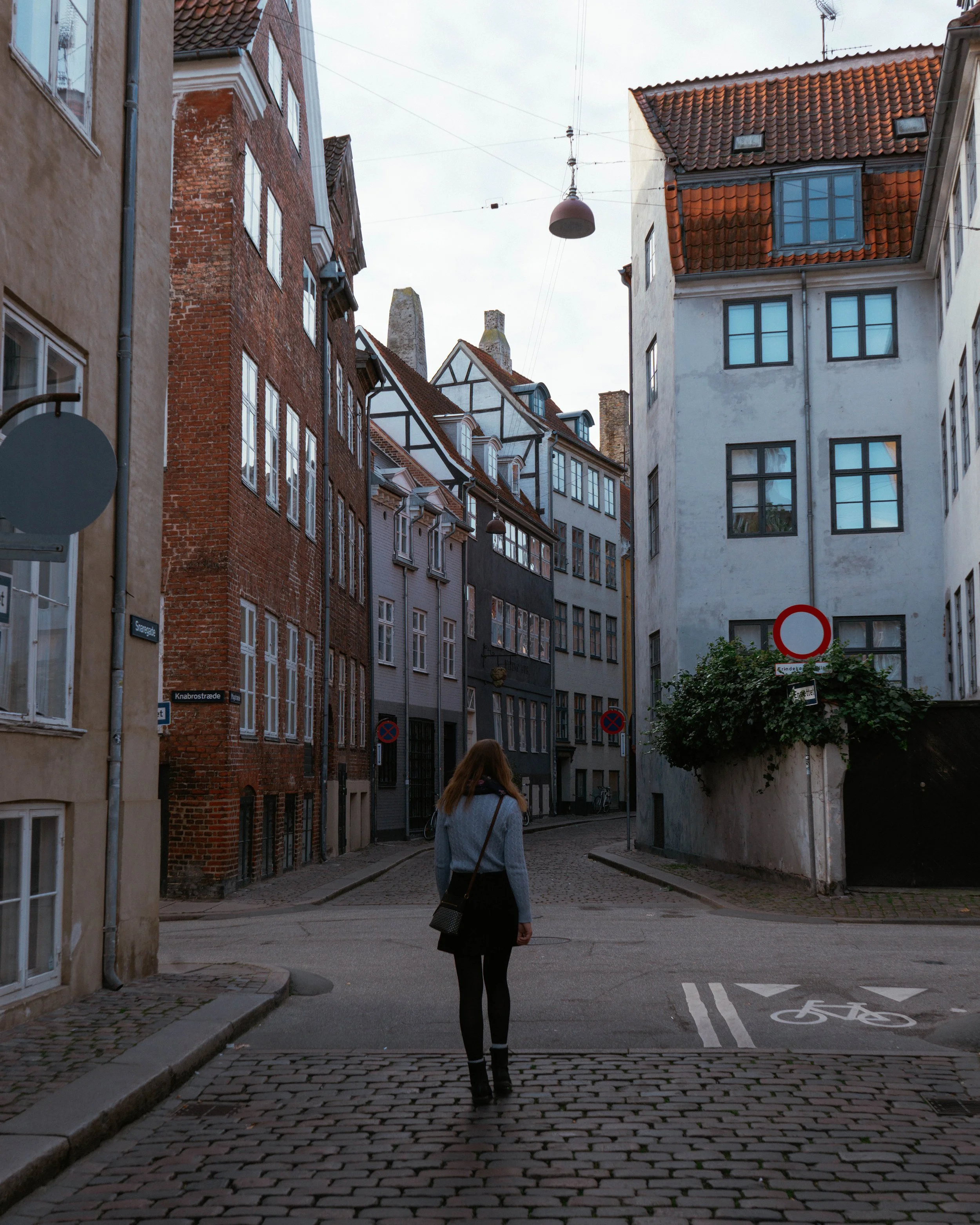 Lifestyle-focused tourist photography session in Copenhagen, blending portraiture with city exploration for visitors wanting timeless travel imagery.