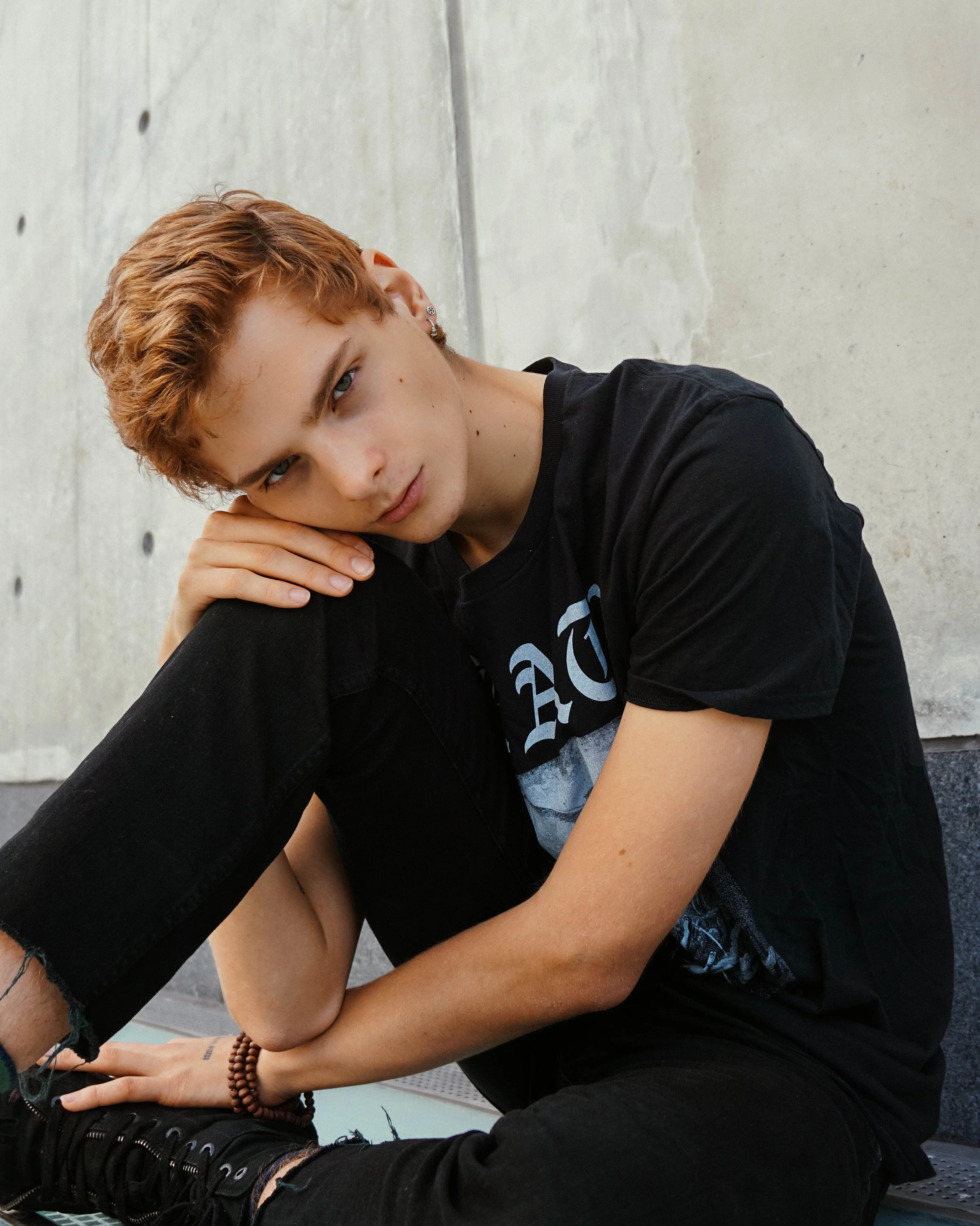 Studio editorial fashion portrait of a model in Copenhagen, highlighting clean lighting, contemporary styling, and cinematic composition.