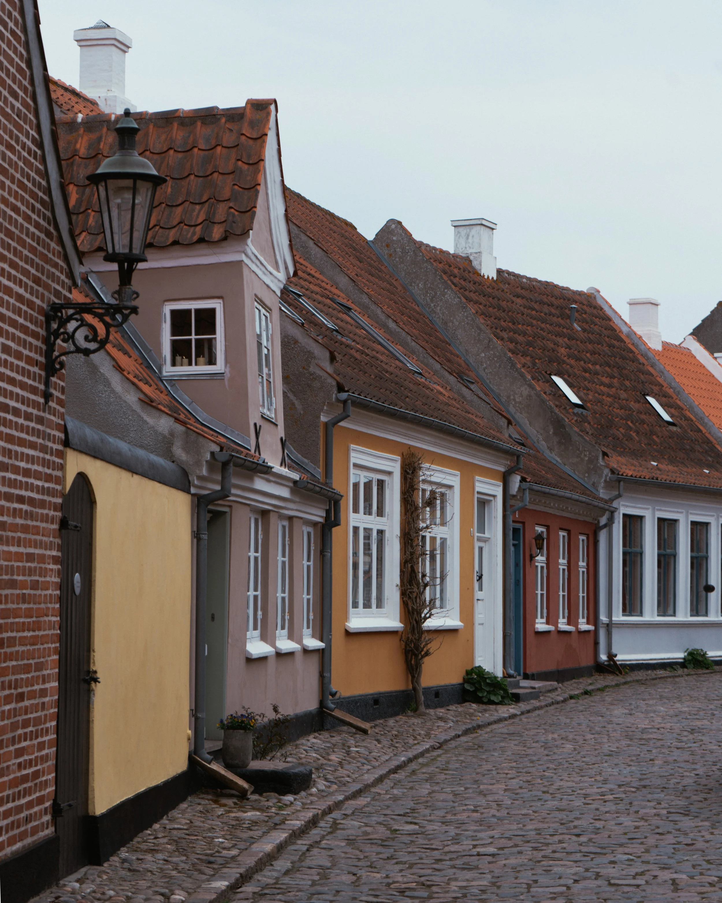 Pastel houses and cobblestone street in Ærøskøbing on Ærø island, Denmark