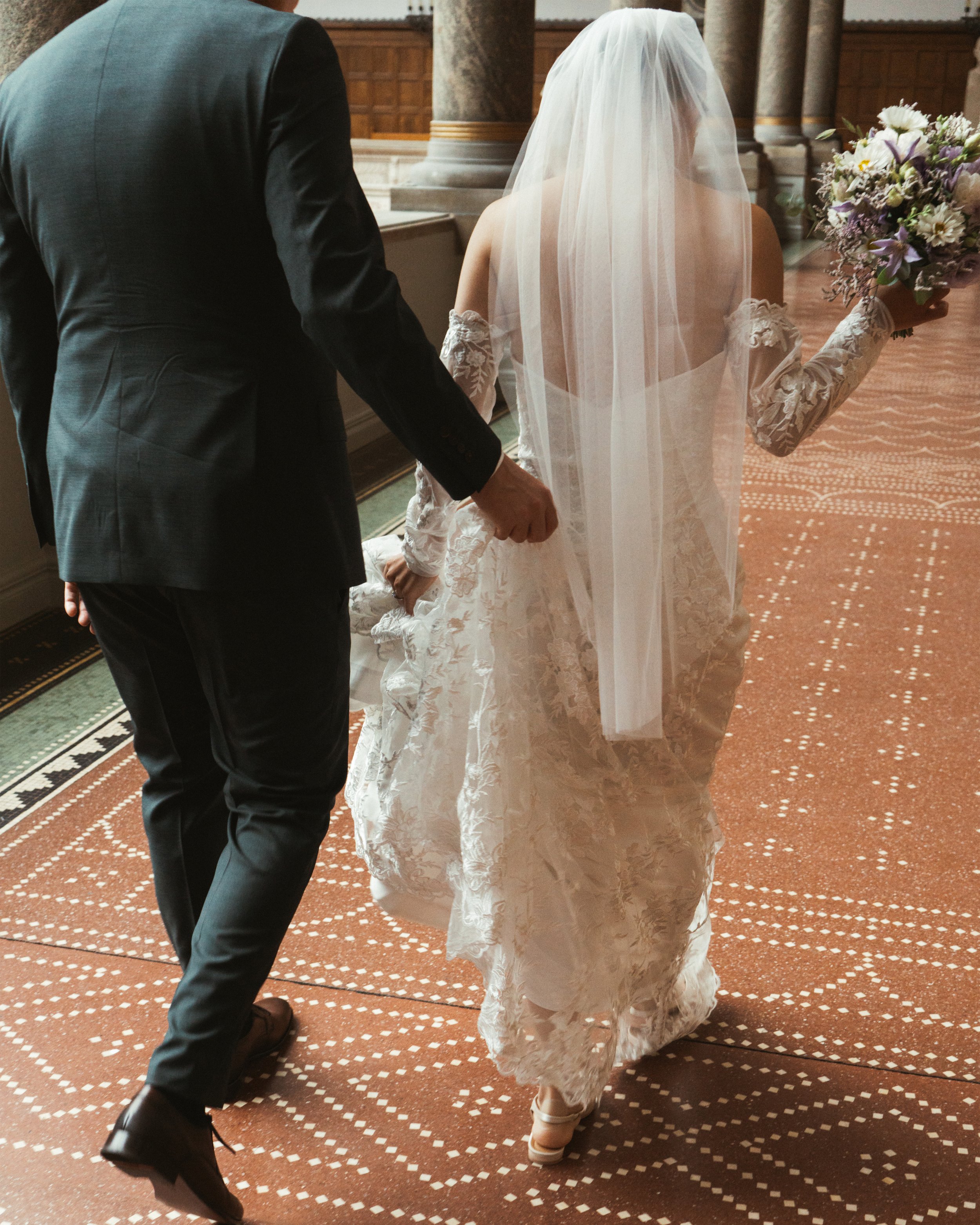 Wedding ceremony in Copenhagen with bride and groom exchanging vows