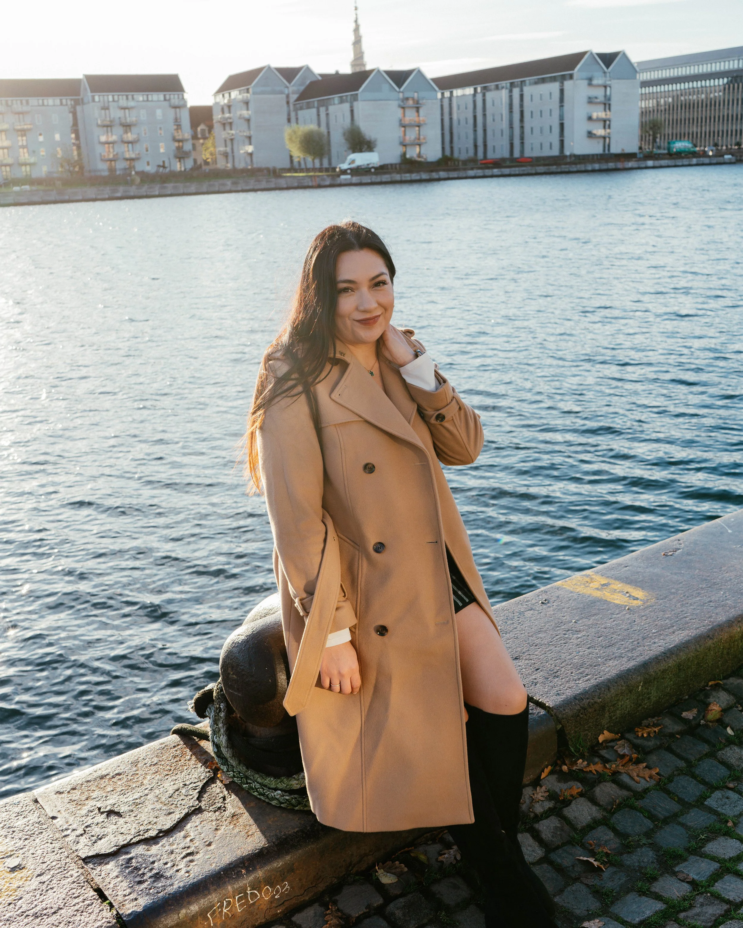 Natural light travel portraits taken in Copenhagen, focused on relaxed expressions and real moments for visitors looking for authentic city photography.