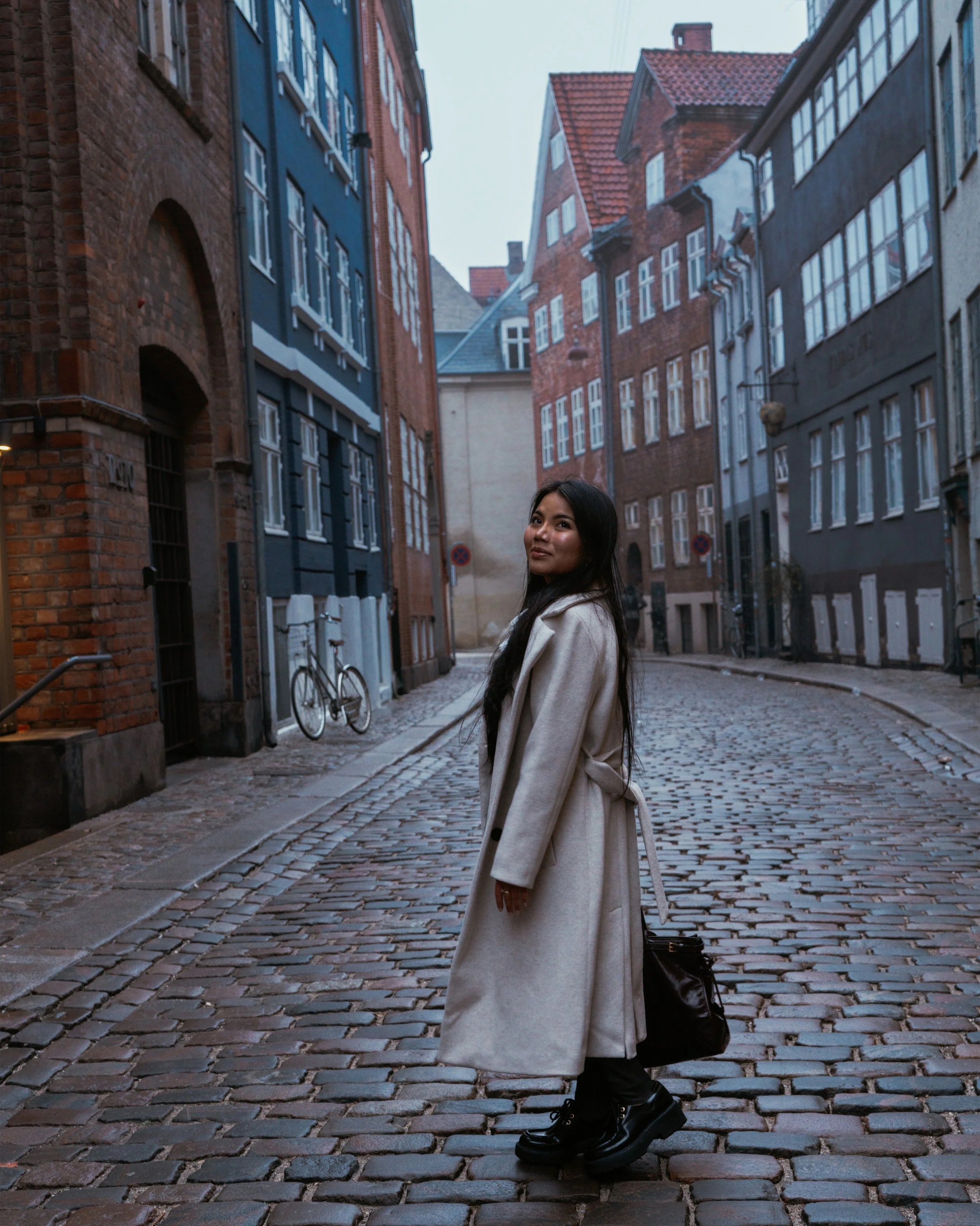 Natural lifestyle portrait session during a travel photography walk in Copenhagen