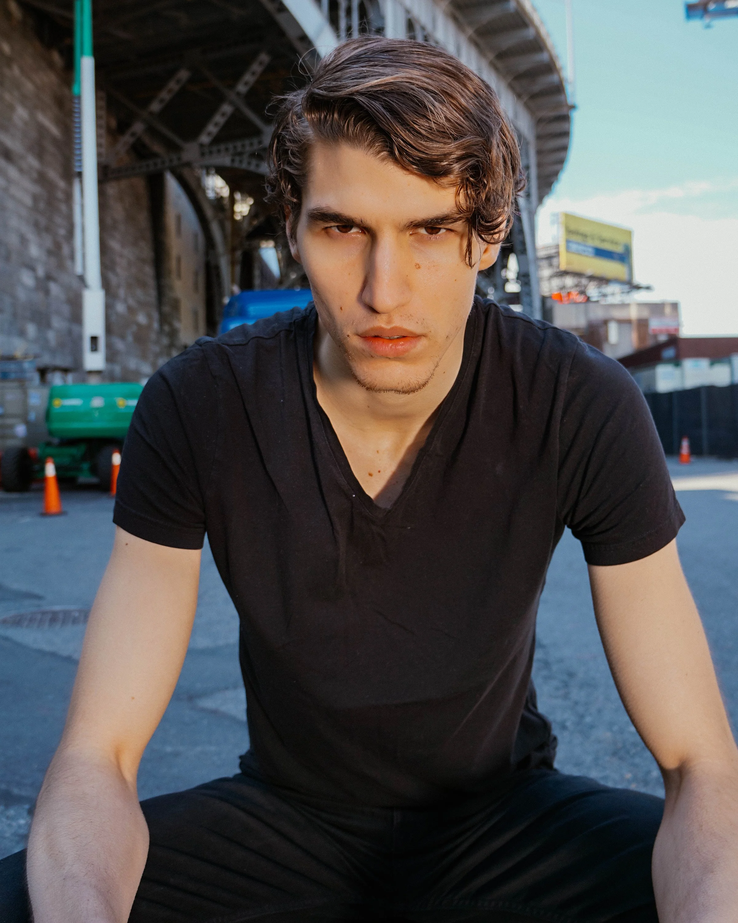 Studio editorial fashion portrait of a model, emphasizing clean lines, contemporary styling, and cinematic lighting in Copenhagen.