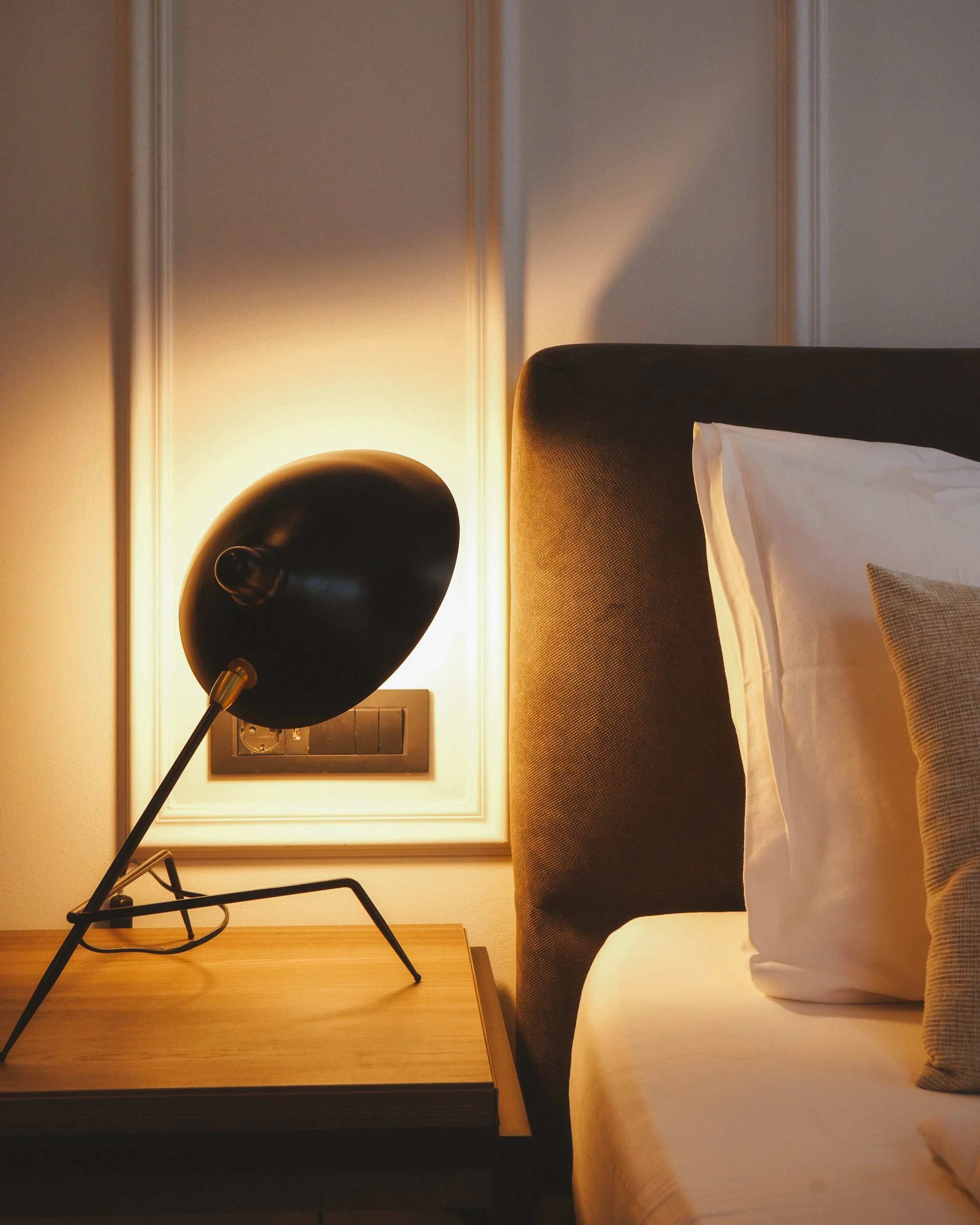Hotel bedroom interior photography highlighting textures, materials, and calm atmosphere in an editorial style.