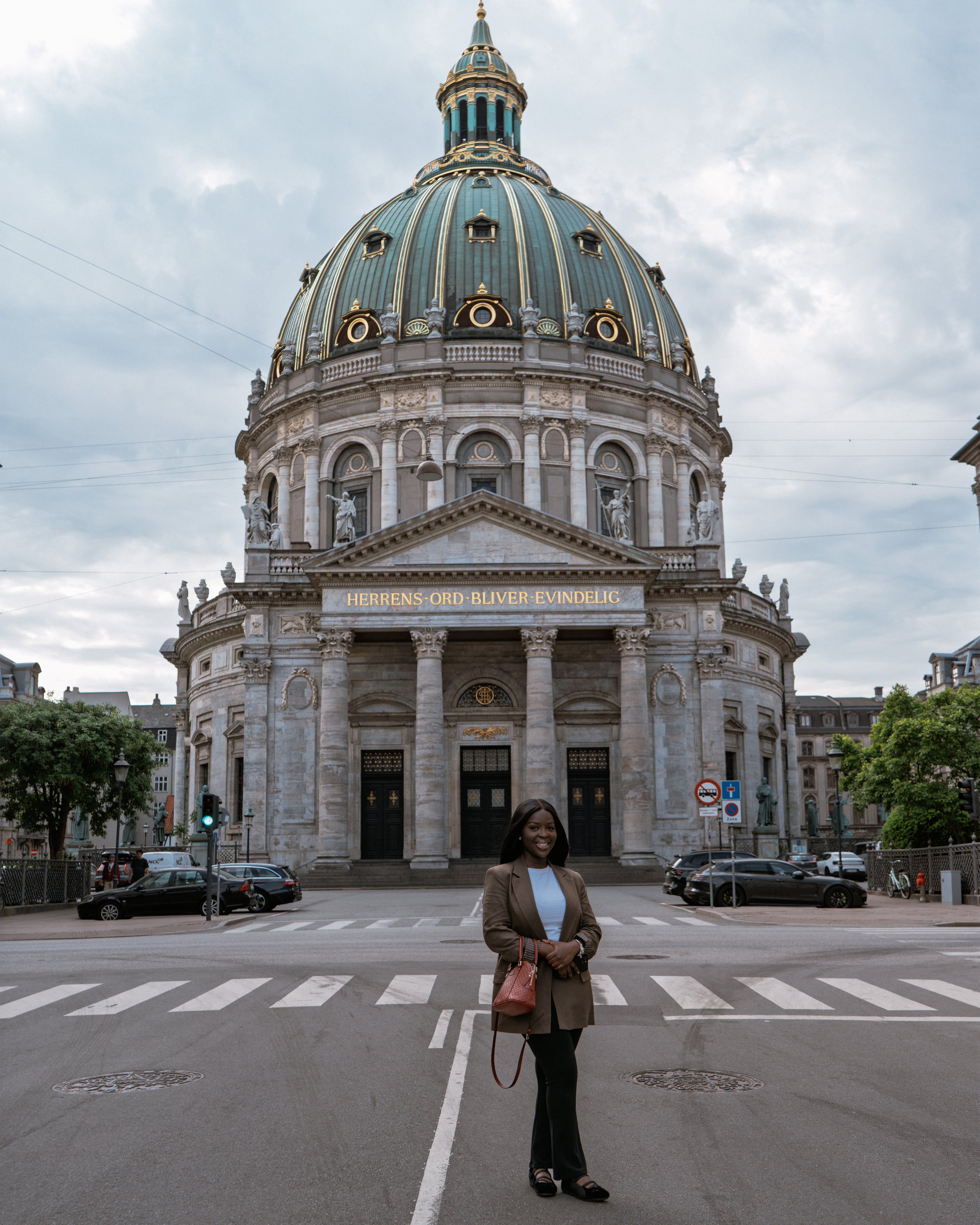 Solo traveller during a professional portrait session in Copenhagen, Denmark
