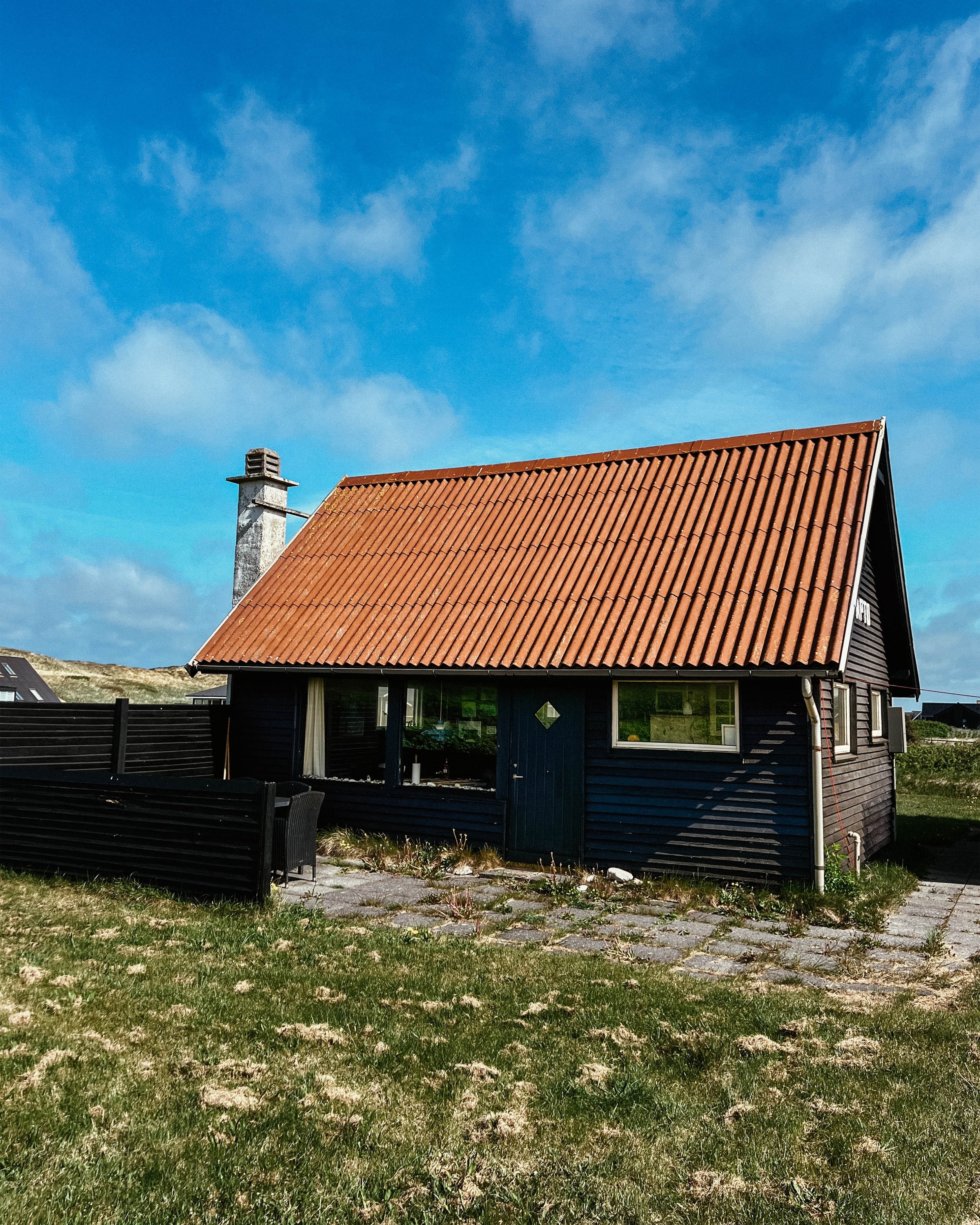 Modern Scandinavian interior photography of a bright living room in Copenhagen summerhouse