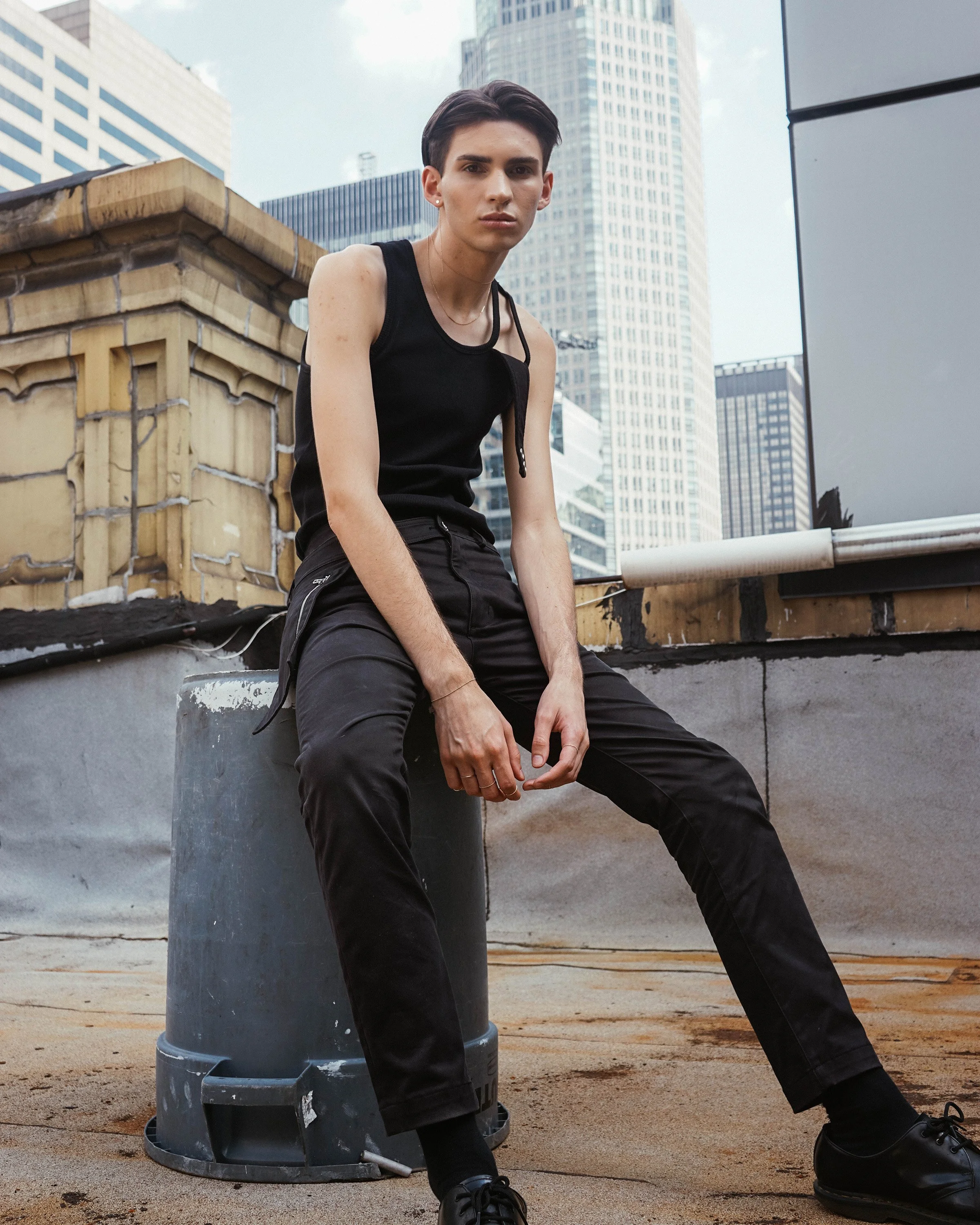 Studio editorial portrait of a fashion model in Copenhagen, highlighting natural gestures, cinematic lighting, and fashion styling.