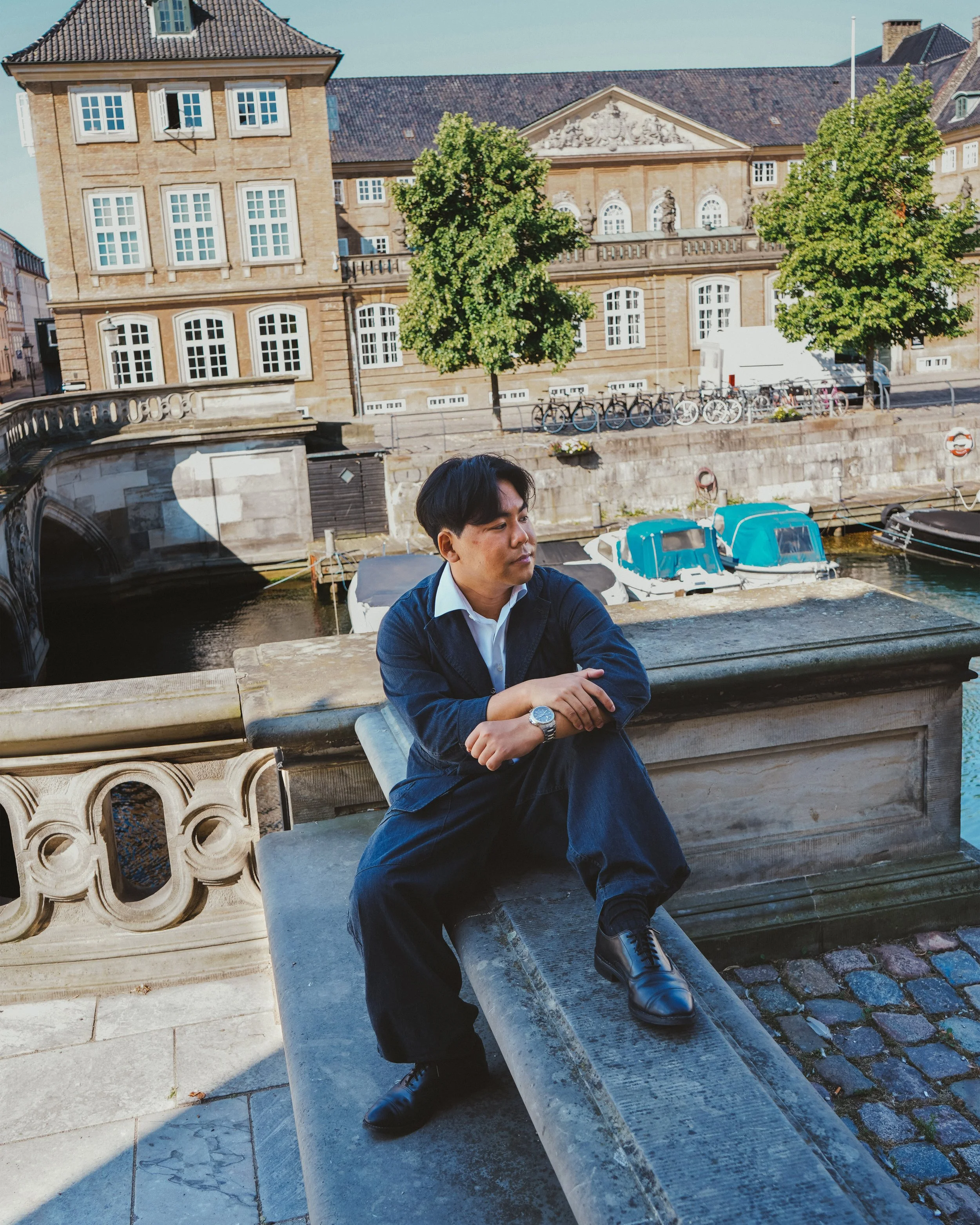 Male traveller walking through Copenhagen streets
