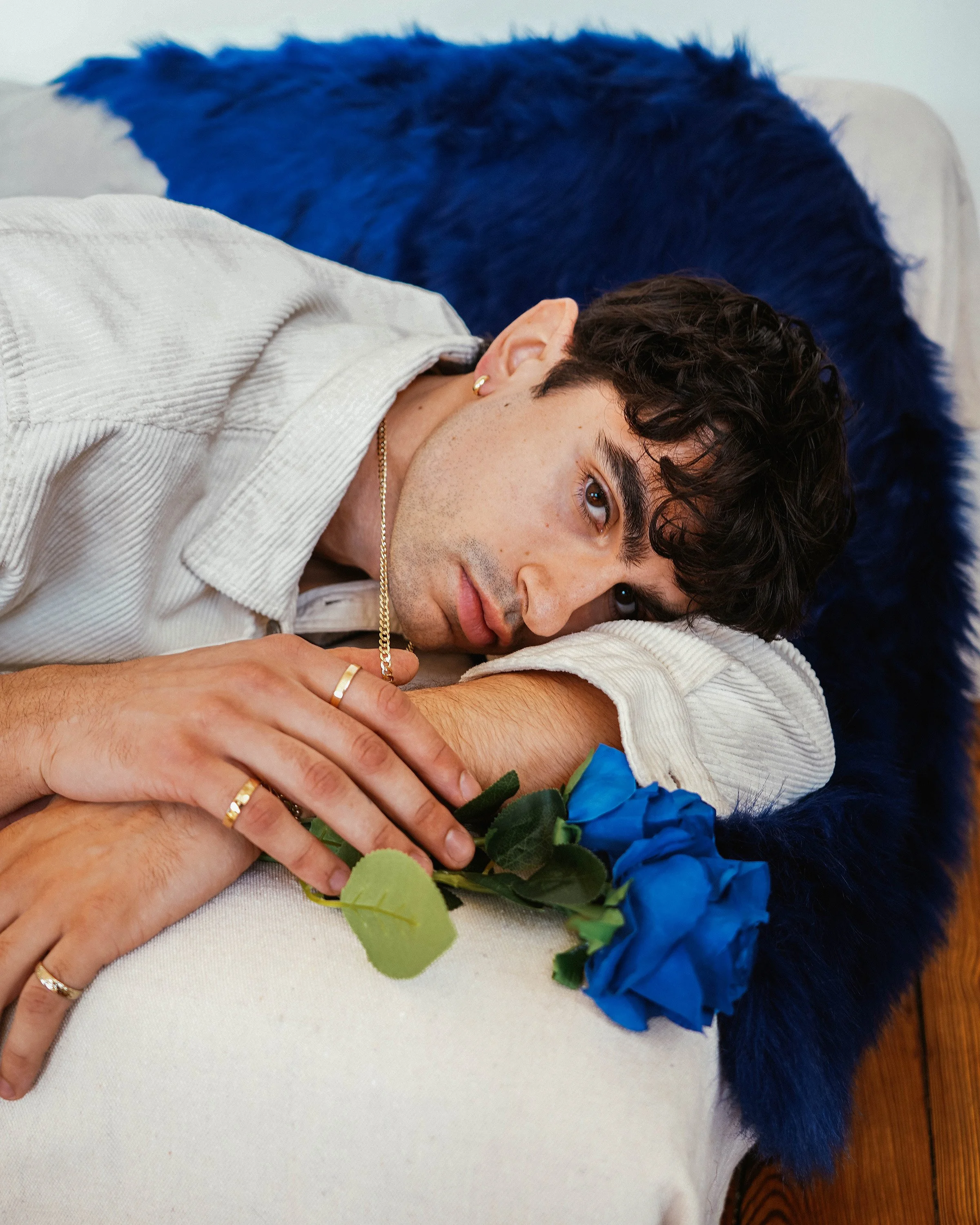 Lifestyle editorial fashion photography of a model in Copenhagen, blending natural gestures with cinematic lighting.