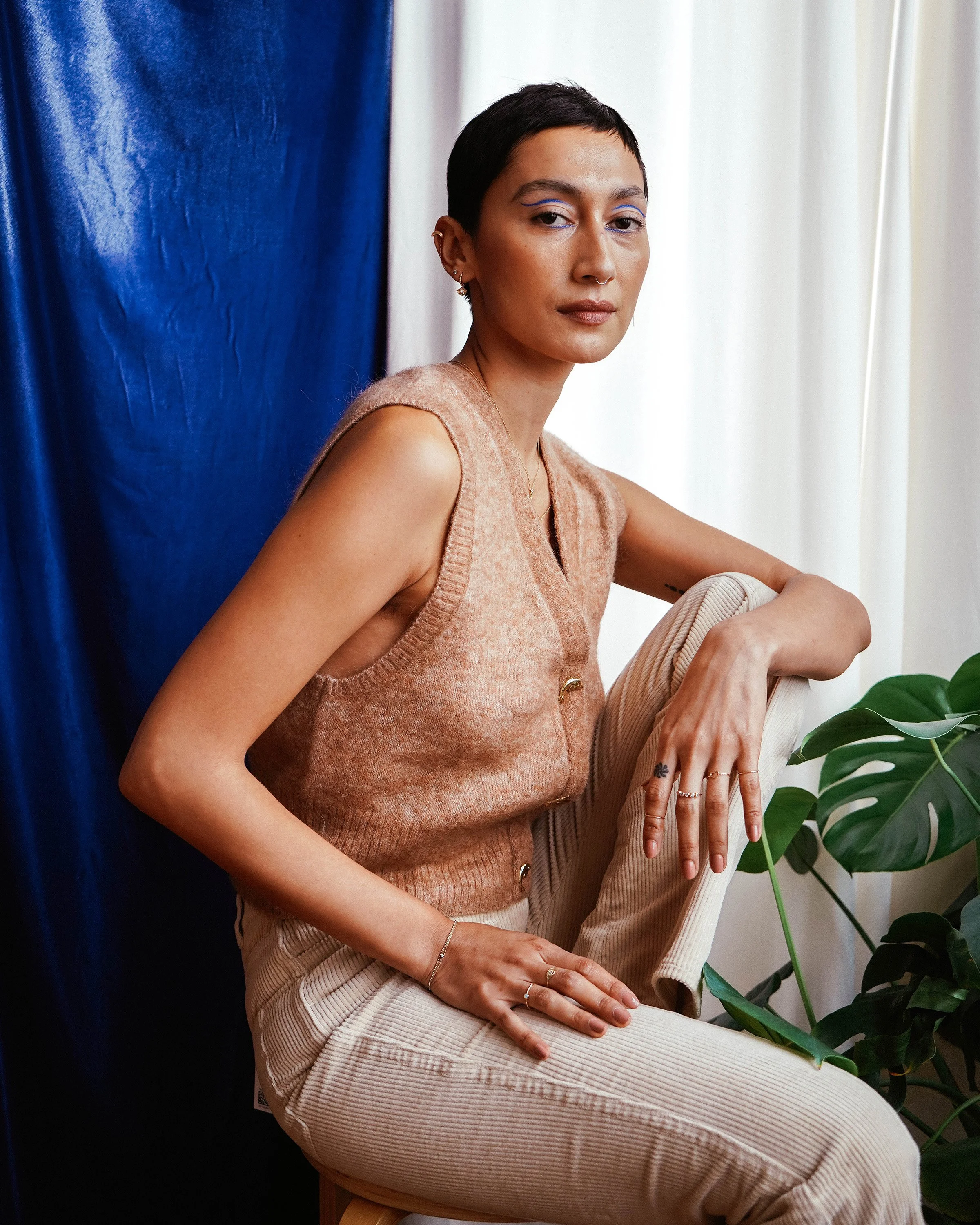 Studio editorial portrait of a couple, styled for fashion photography with authentic and cinematic approach.