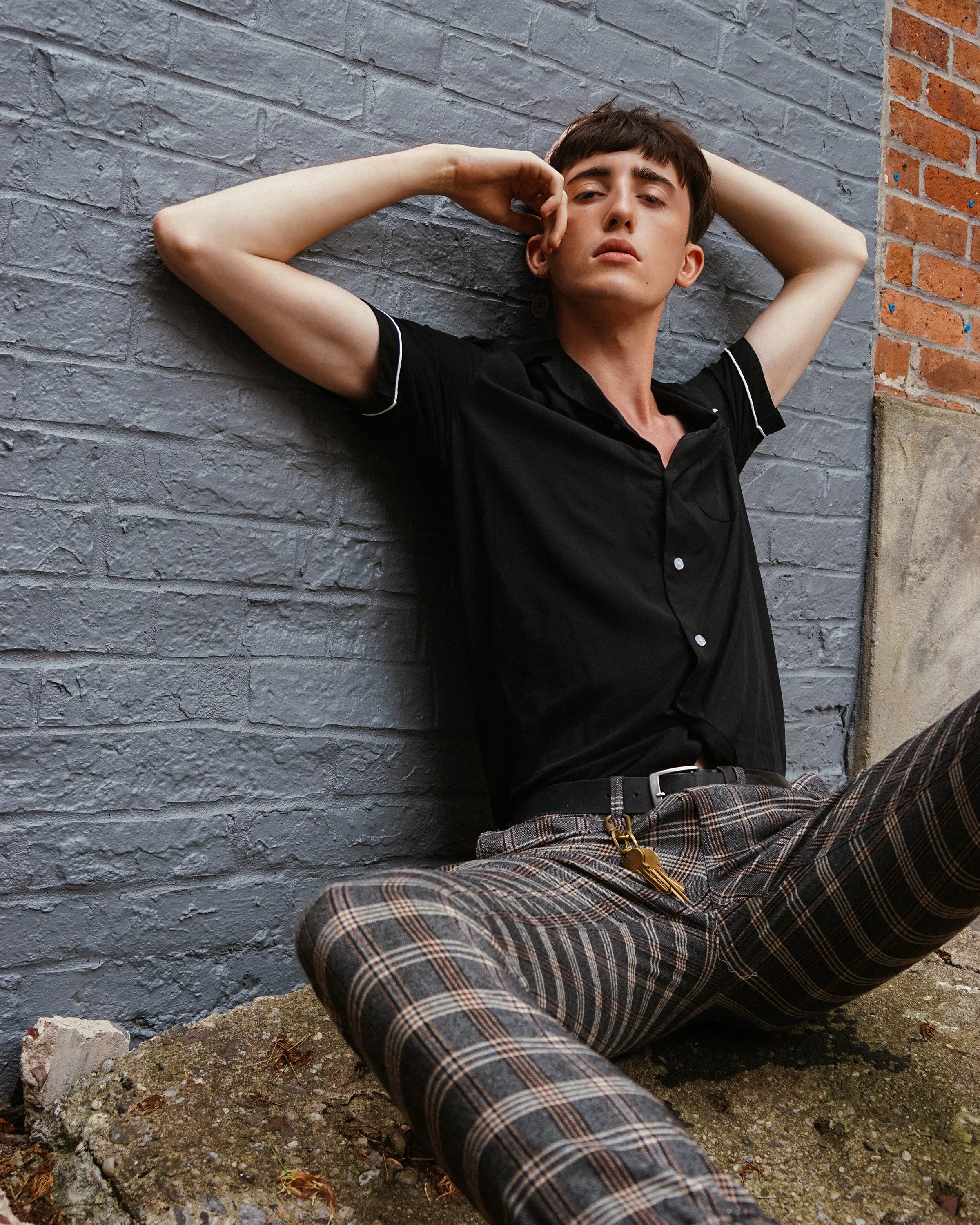 Studio editorial shoot for a fashion campaign, featuring models in contemporary styling and cinematic lighting.