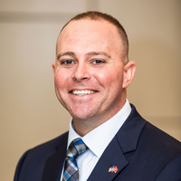 Evan, Marine veteran, helps direct our business technology team. His career has been an impressive one where he'shelped so many others. 