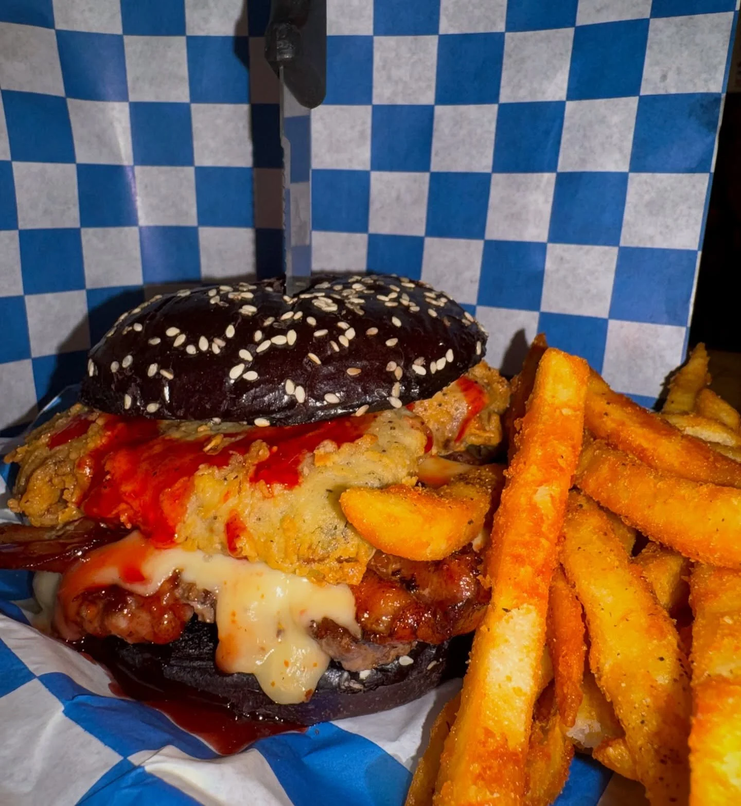 🦇 MOTHMAN BURGER 🦇

🍔 1/2 lb. Patty
🤤 Deep Fried Jalape&ntilde;o Poppers with Cream Cheese, Wrapped in Bacon
🥓 Extra Bacon
🌶️ Ghost Pepper Jack Cheese
🩸 Cherry Chipotle Blood Sauce

Available until Oct. 31st and while supplies last. 🔥😎

📍 3