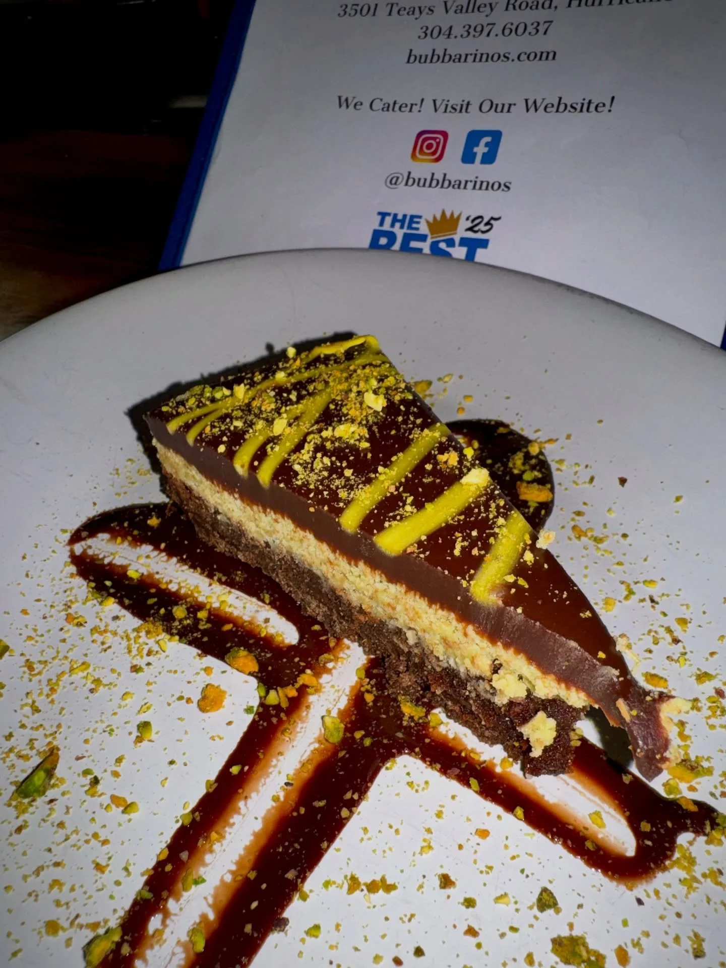 Dubai Chocolate Torte Cake | Now Available 🔥

Fall in love at first bite! This indulgent dessert layers a rich chocolate graham crust with silky ganache and a crunchy pistachio-kataifi filling, all topped with more velvety chocolate. Finished with a