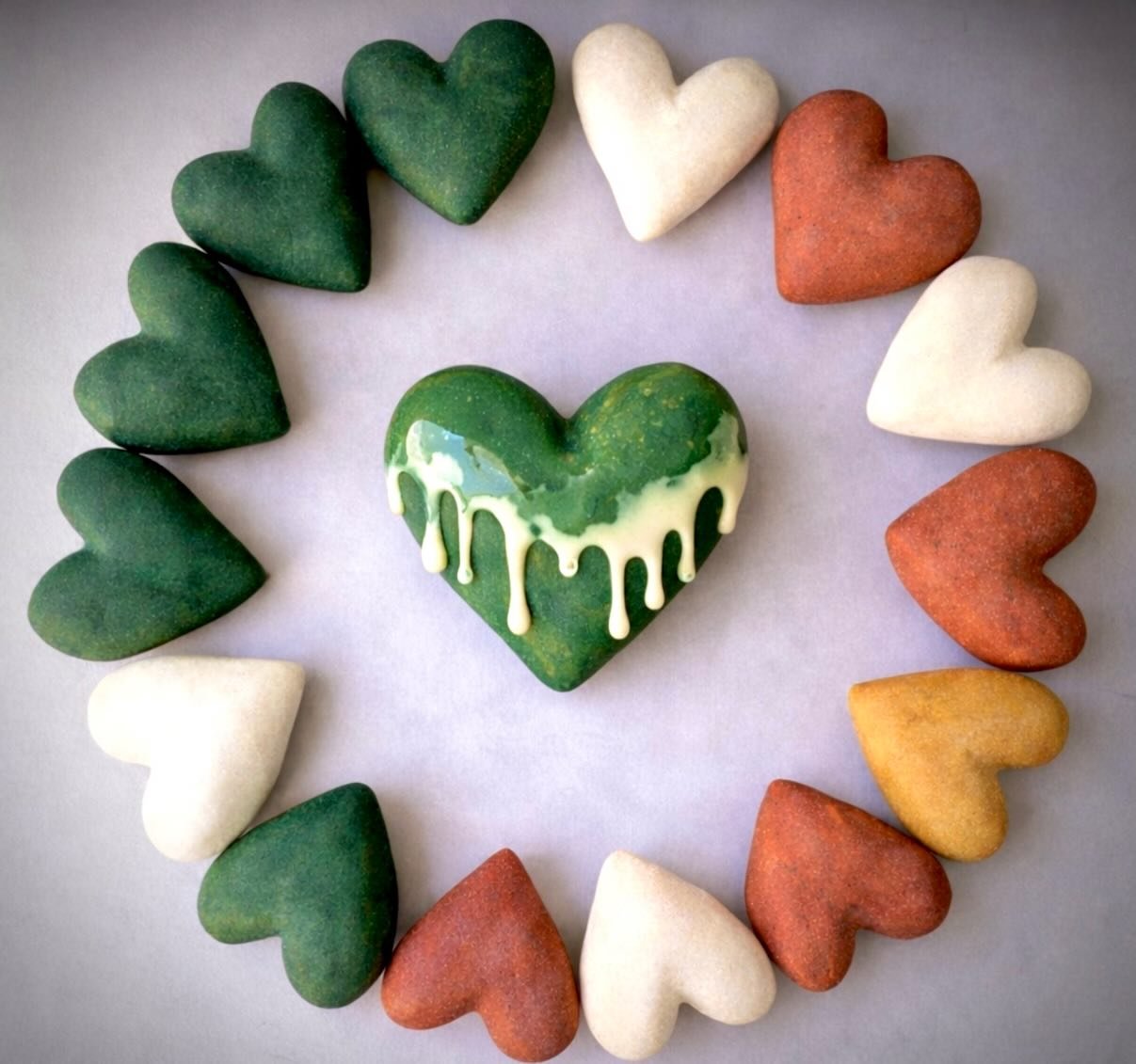 I got inspired by these rustic earthy hearts that I saw online and decided to hand-build my own. 
I&rsquo;m currently glazing them by using a mix of deep forest greens and a creamy white drip. 

Which one is your favorite? ✨

#ceramics #handbuiltpott