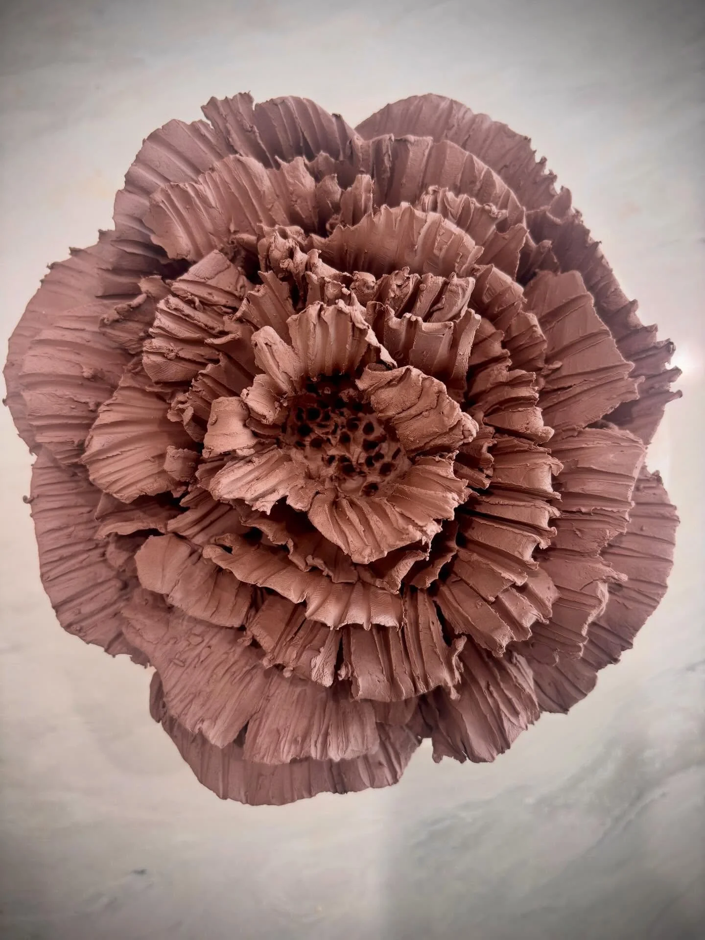 I&rsquo;ve been quiet here, taking a little space to breathe, to feel, to reflect.

Yesterday, I found myself back in the clay&mdash;hands moving, heart heavy, shaping something that didn&rsquo;t need words. This flower came through in layers&hellip;