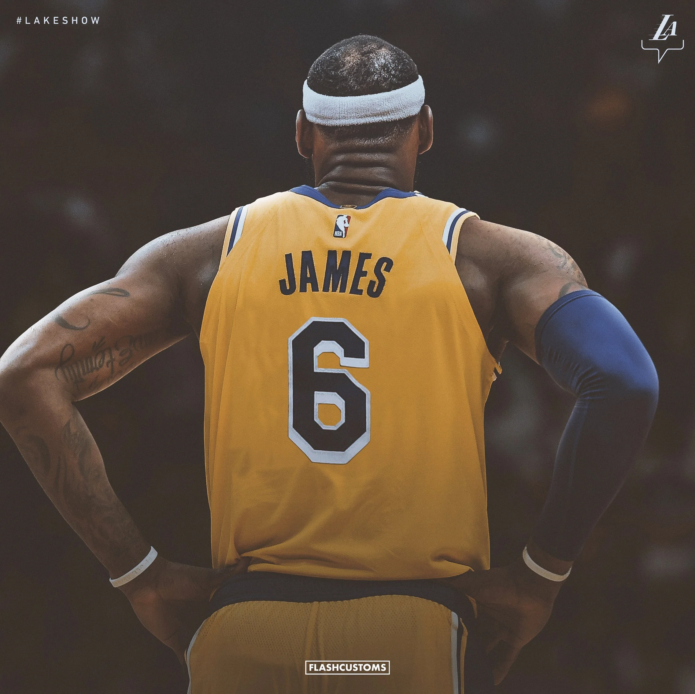 Back of a basketball player wearing a yellow and black jersey with the name James and the number 6, seen from behind, with a white headband and tattooed arms.