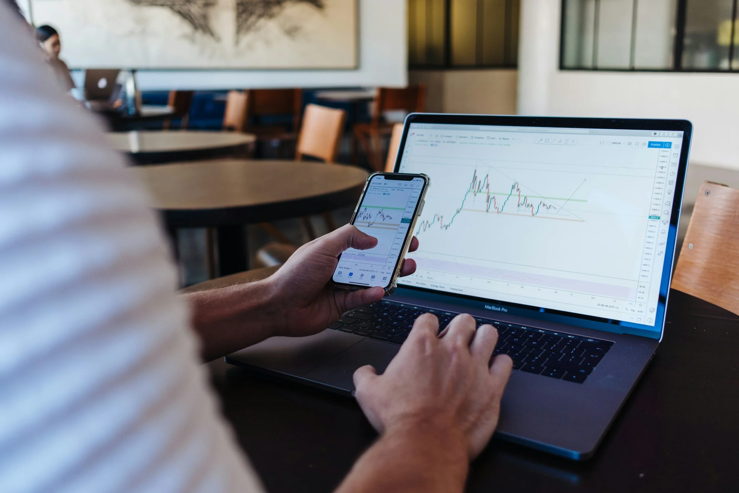 man looking at stocks on computer