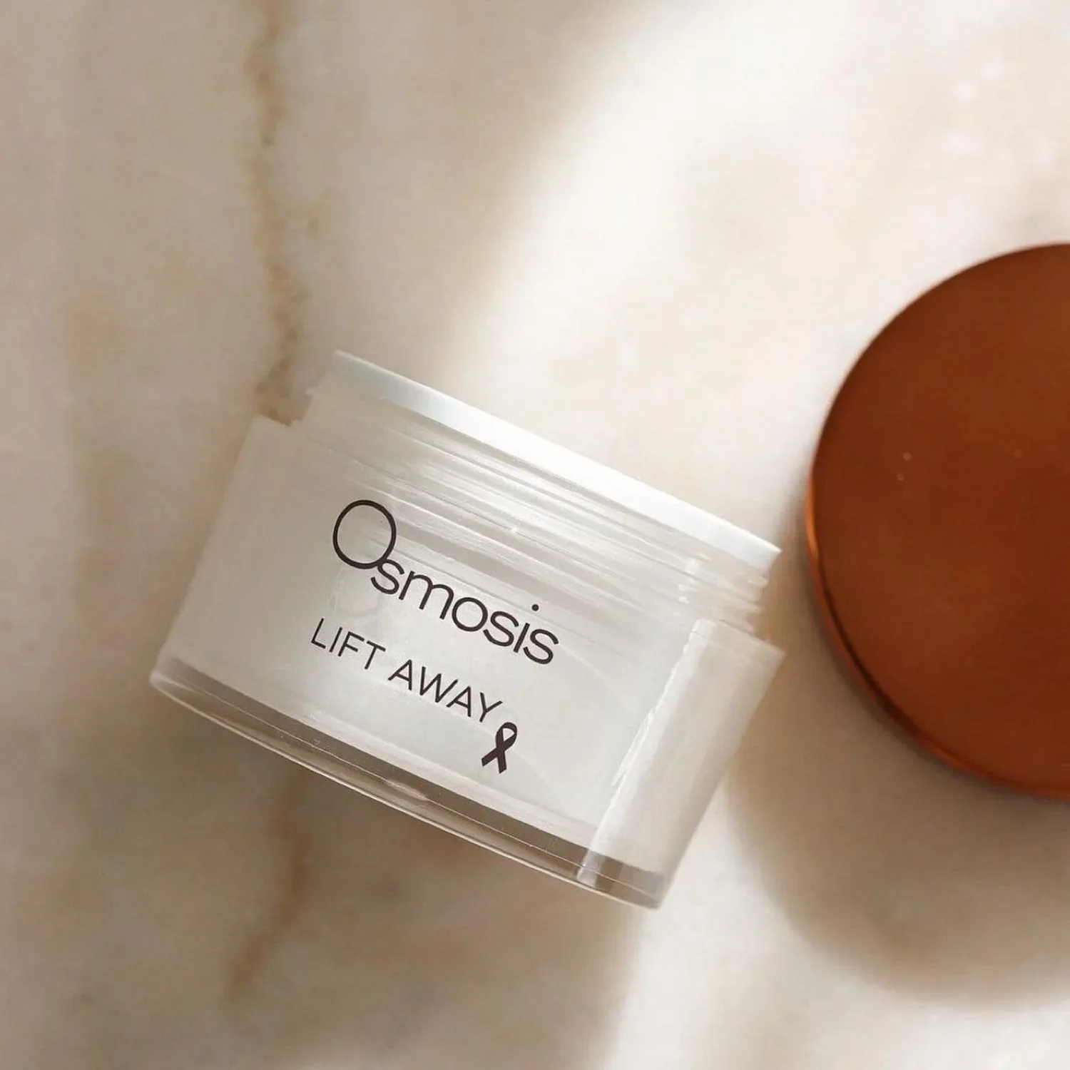 Osmosis-Lif-Away-balm-to-remove-makeup-and-impurities-1oz-30ml-lifestyle.webp