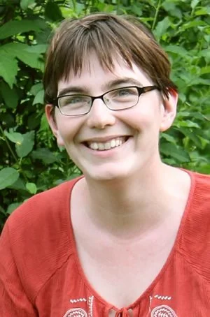 Ada Hoffmann 
Ada Hoffmann has published dozens of short stories and poems and is the author of the space opera novels THE OUTSIDE and THE FALLEN (Angry Robot). They are an autistic self-advocate, a LARPer, and an adjunct professor of computer scien