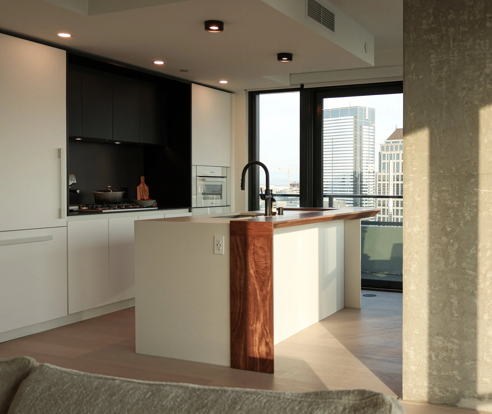 Custom design and manufacturing of a walnut addition for an existing kitchen island, made in Seattle by Atelierluer