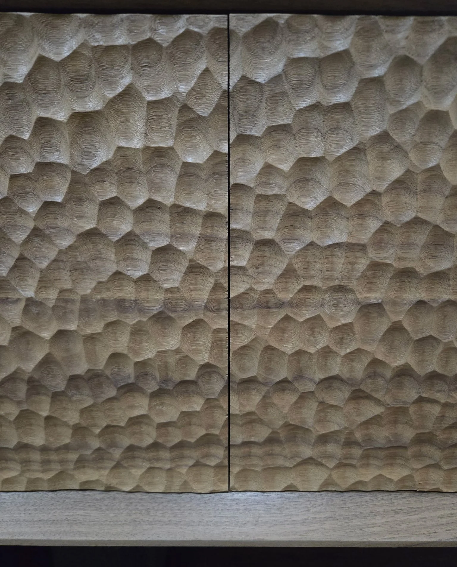 Solid walnut Tv stand with gouged drawer fronts close up