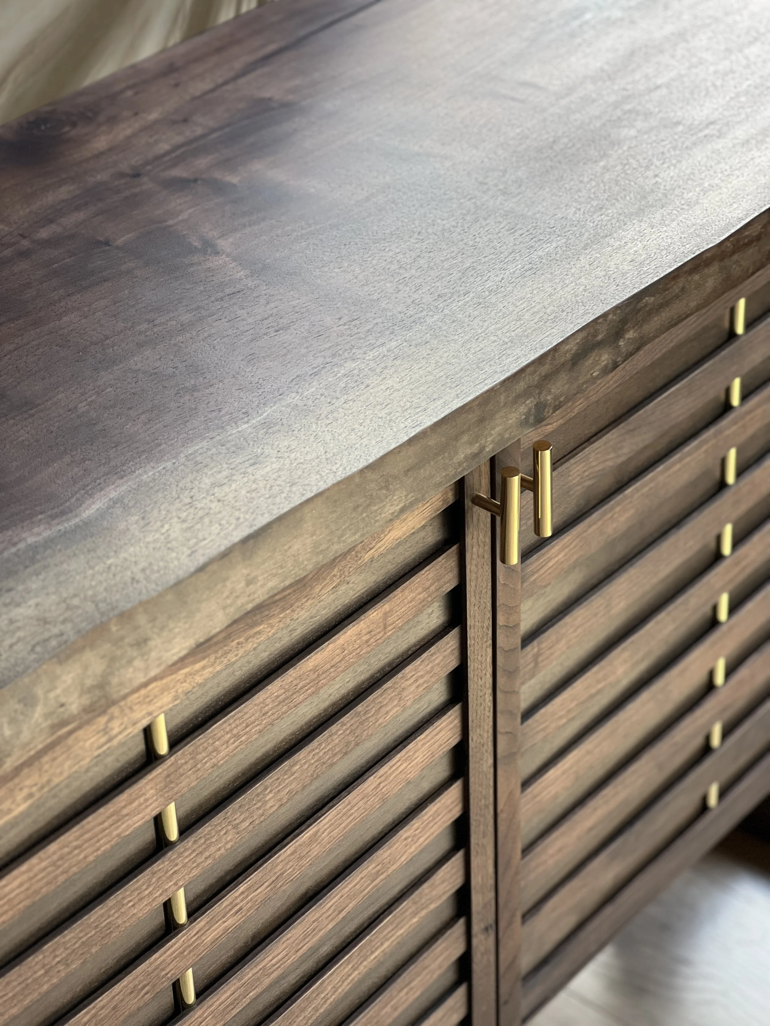 Custom credenza with Walnut slab , made in Seattle
