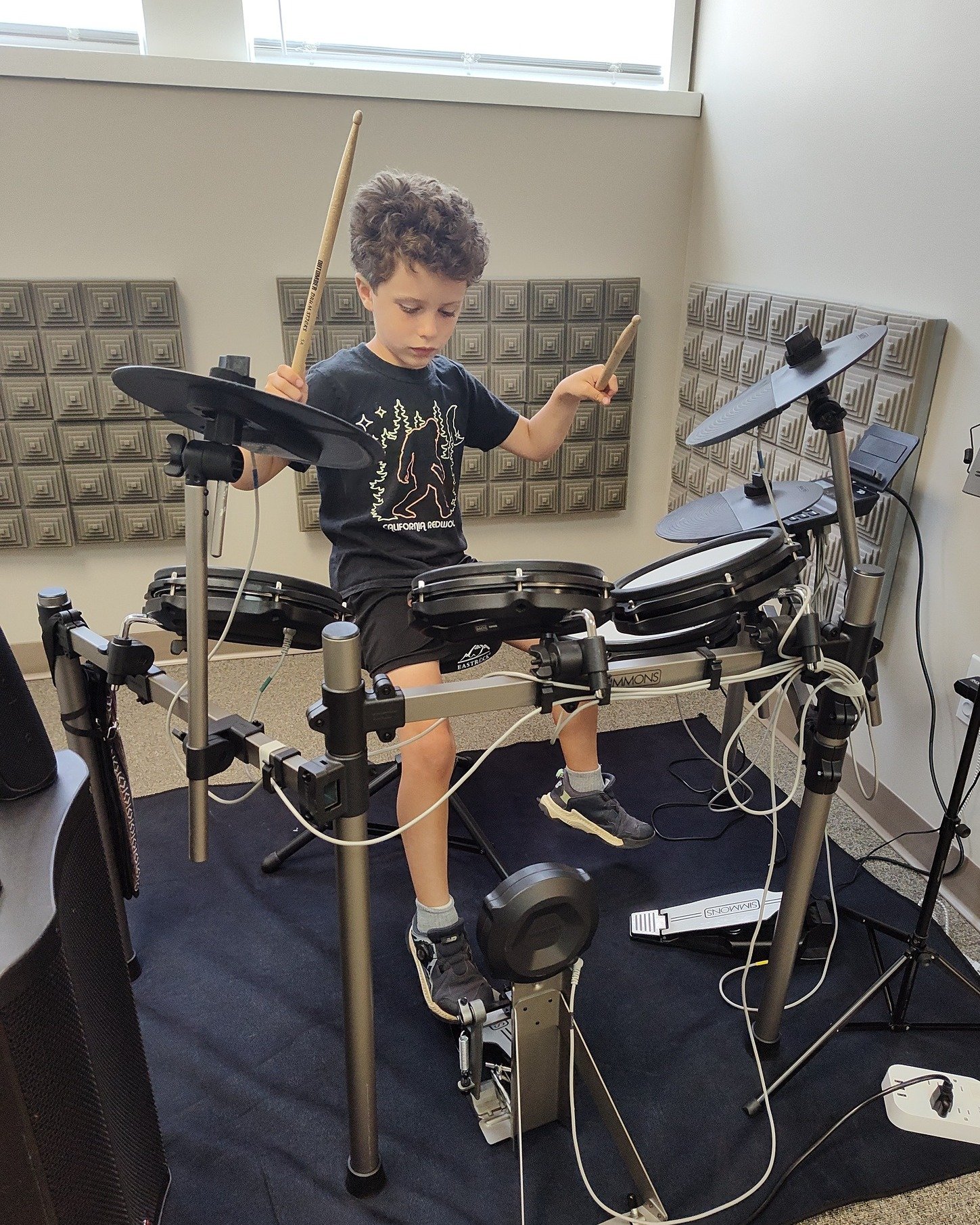 Day 2 of Rock Band camp - everyone got to spend some time on the drum set while other rockers practice with hand drums.  Can't wait to put the whole ensemble together for Day 3! 🤘