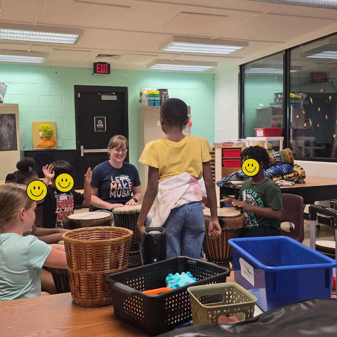 So excited for this new kids community music group! Pictured, one of the students and I have traded places as the leader and the kids and I are following her lead playing on these amazing djembes that were already on site.  They've asked for guitar a